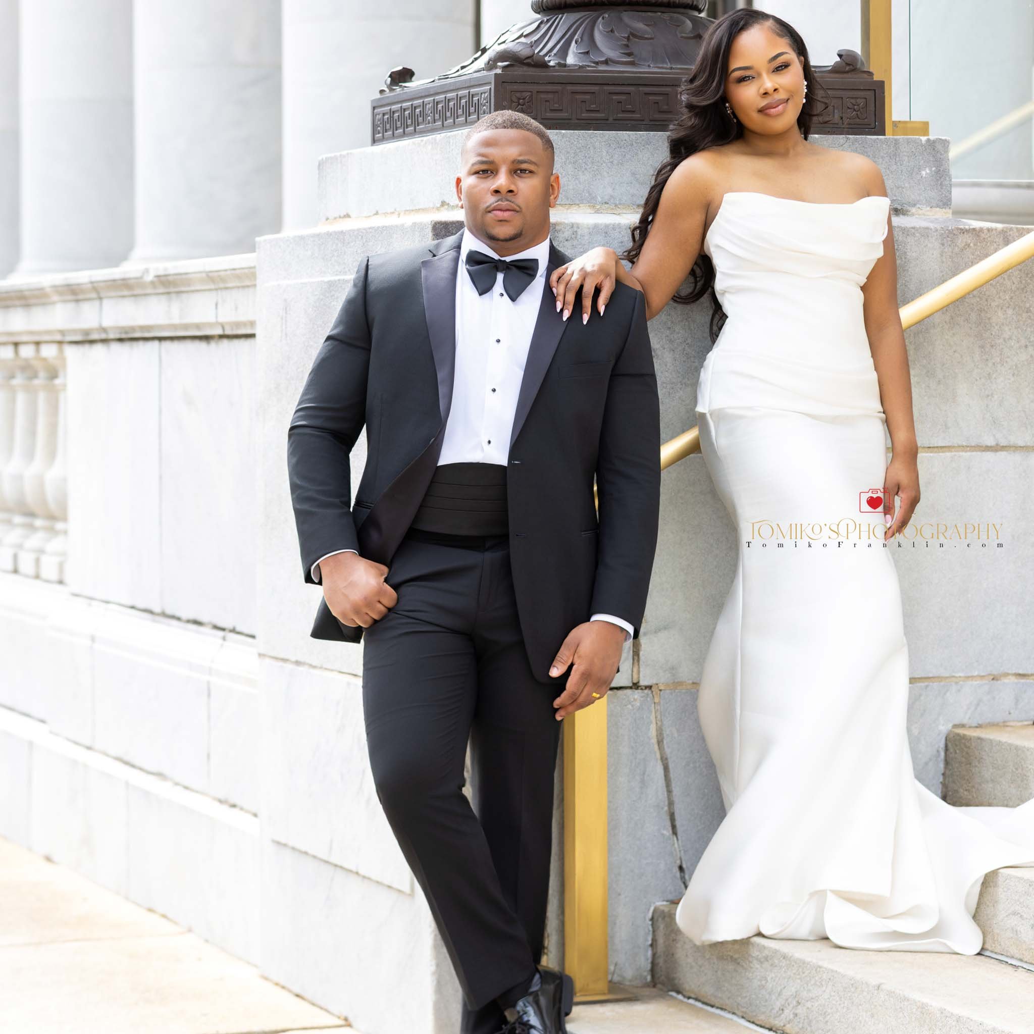 Birmingham elopement photos of a couple celebrating after their courthouse vows.