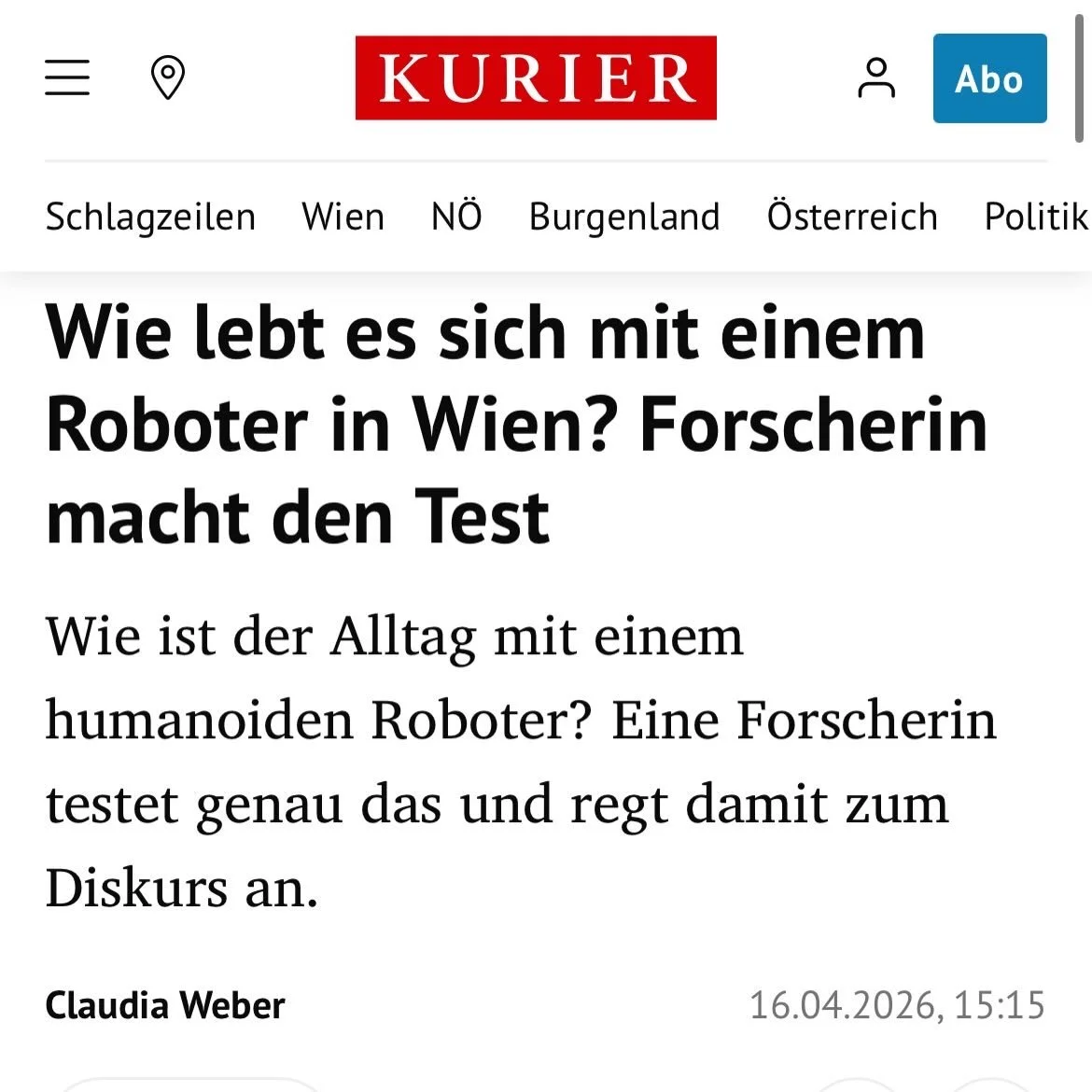 woman sitting with robot for interview