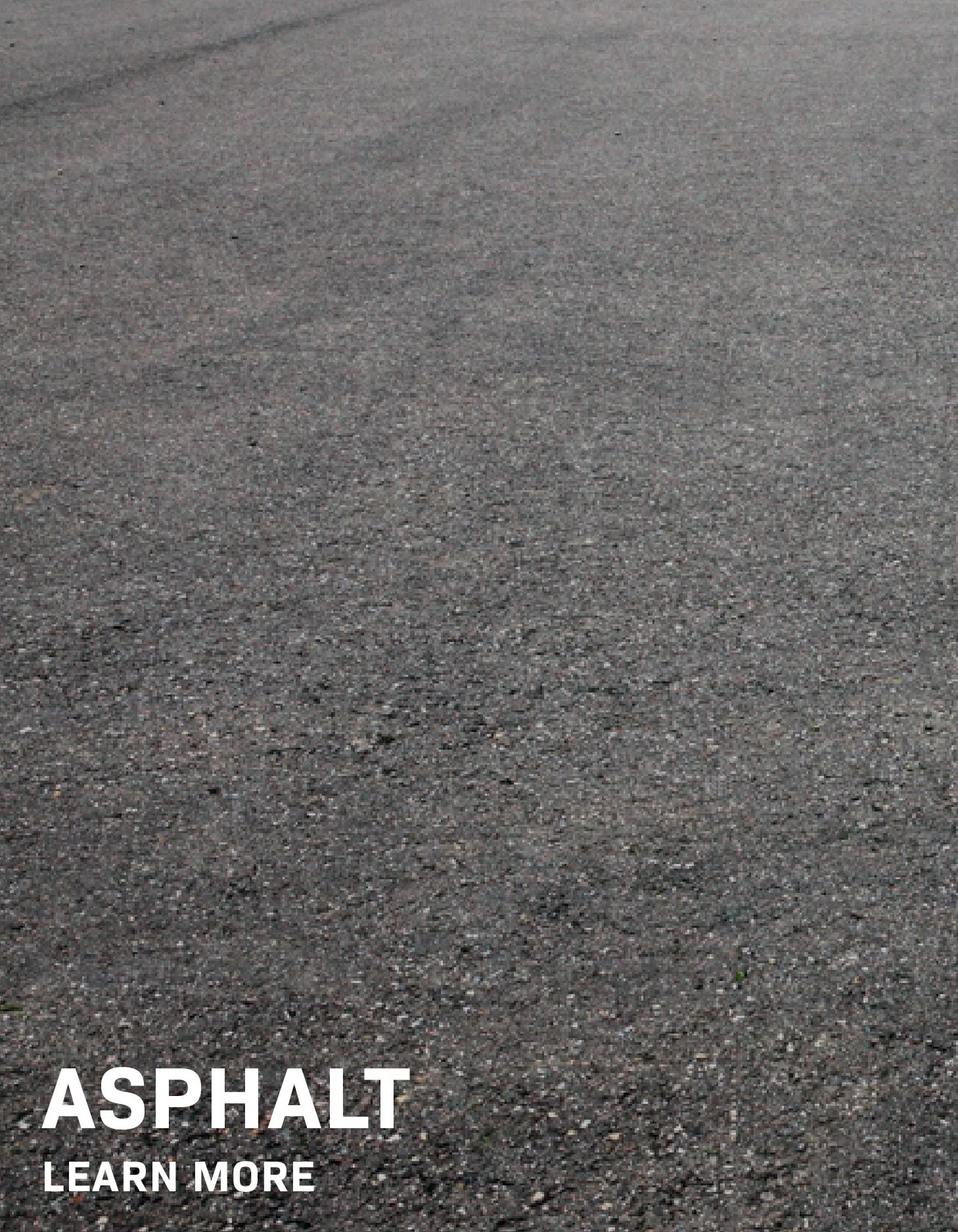 "Asphalt" Text overlaid on black asphalt