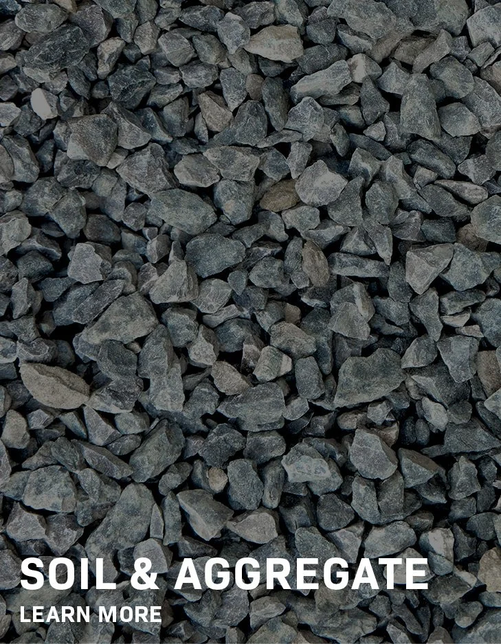 "Soil & Aggregate" Text over a pile of gray gravel