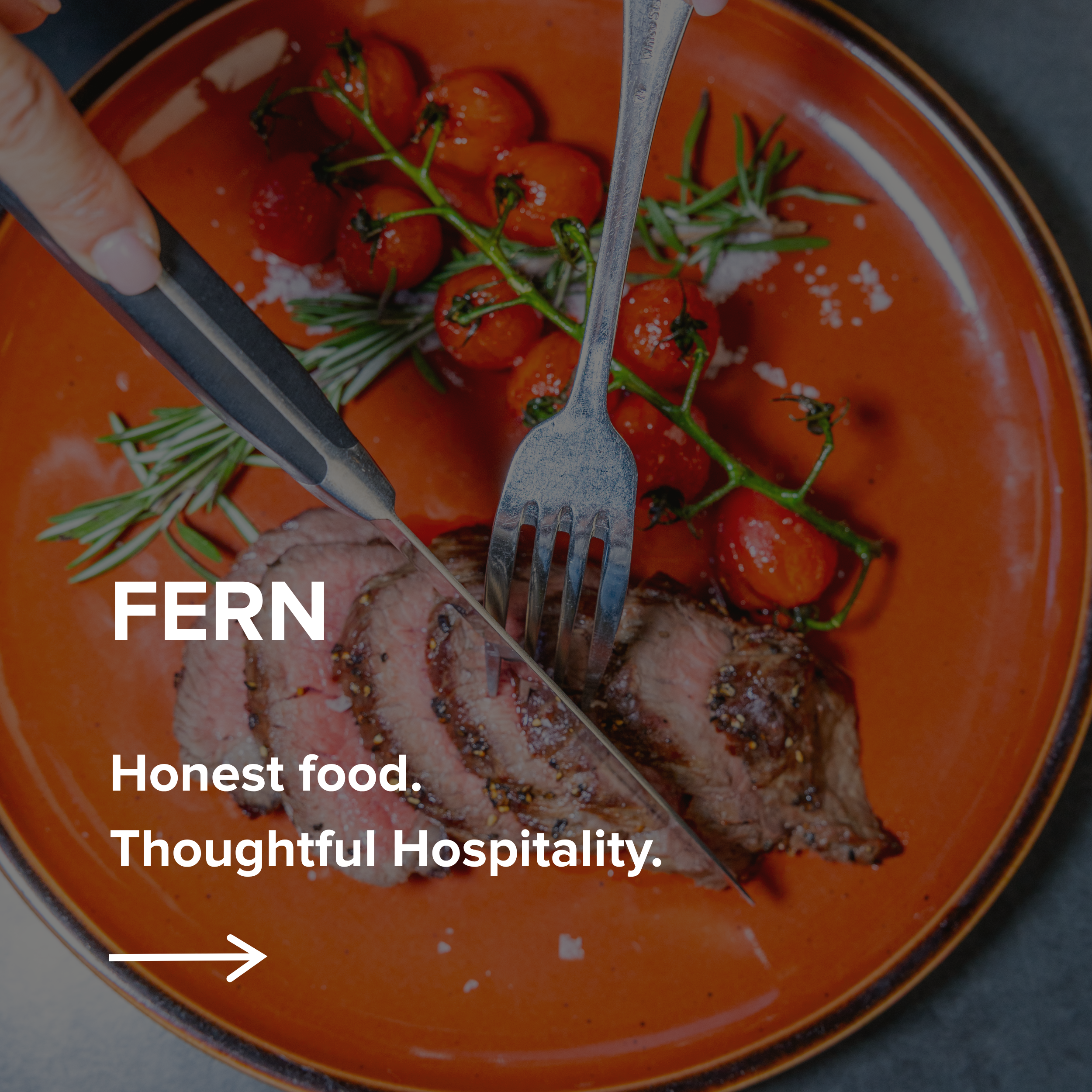 Image of Steak Dinner on a red plate linking to webpage for Fern Restaurant.png