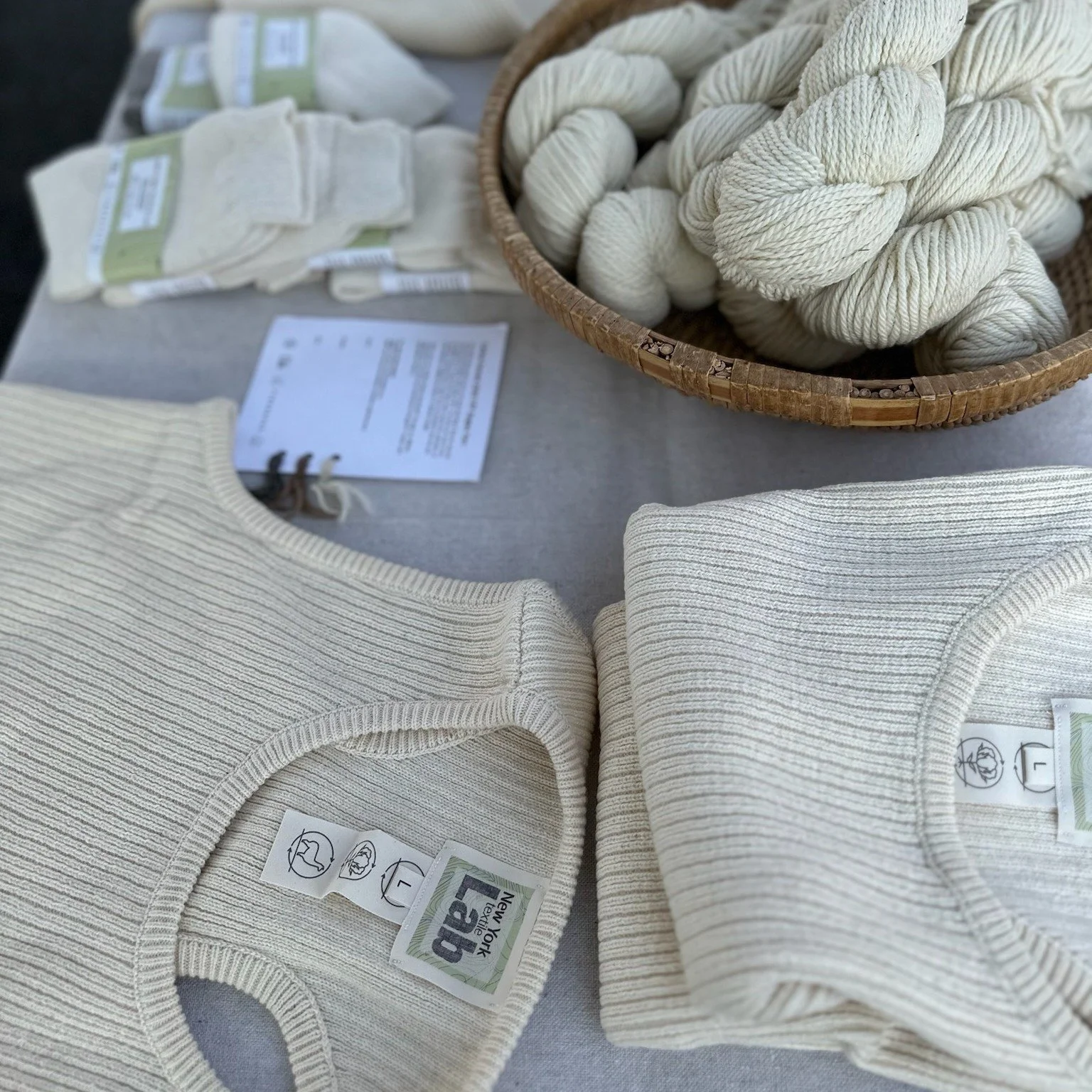 NY Textile Lab is joining us this Saturday and with perfect timing! They have lots of high quality textiles all made from super high quality yarn. Whether you need a new hat, socks, or a beautiful sweater, they have amazing stuff to keep you warm, co
