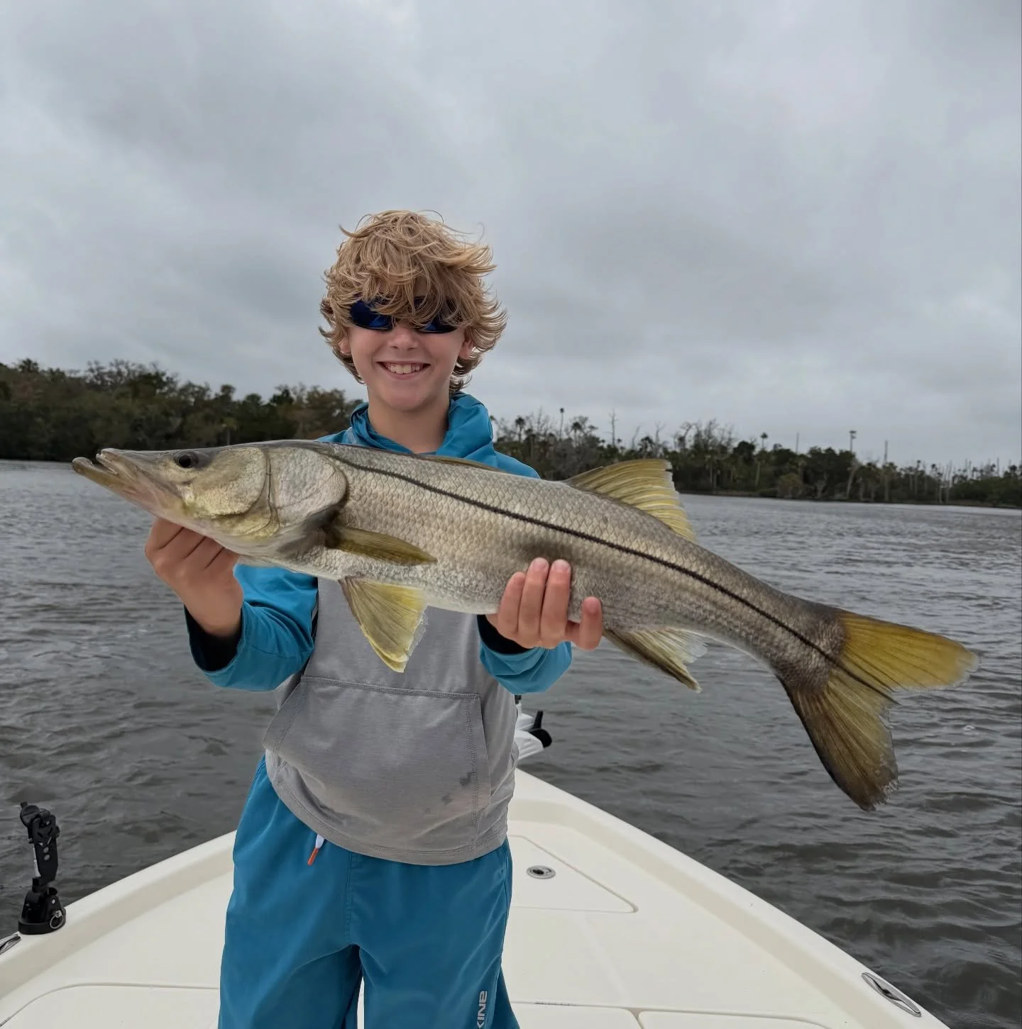 Today I had one of my long time clients, Dewey, on the boat with his 2 grandsons. We kept a close eye on the weather and decided to give it a shot since the rain held off for the morning. Started off catching a few nice trout then the wind just kept 