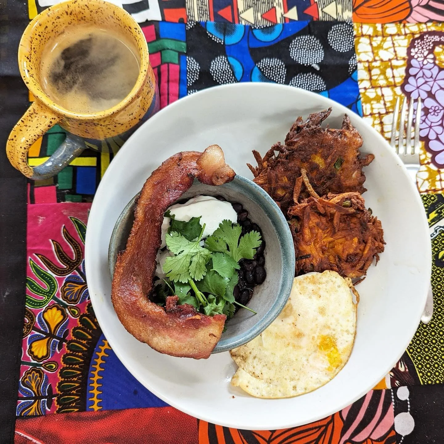 starting the day right makes all the difference! here are some of our recent breakfast plates 🌻🍳🧇☕️

- sweet potato latke, fried egg, black beans, bacon and hot coffee 
- muhummara with heirloom tomatoes, scrambled eggs, greens and @cheeseboardcol