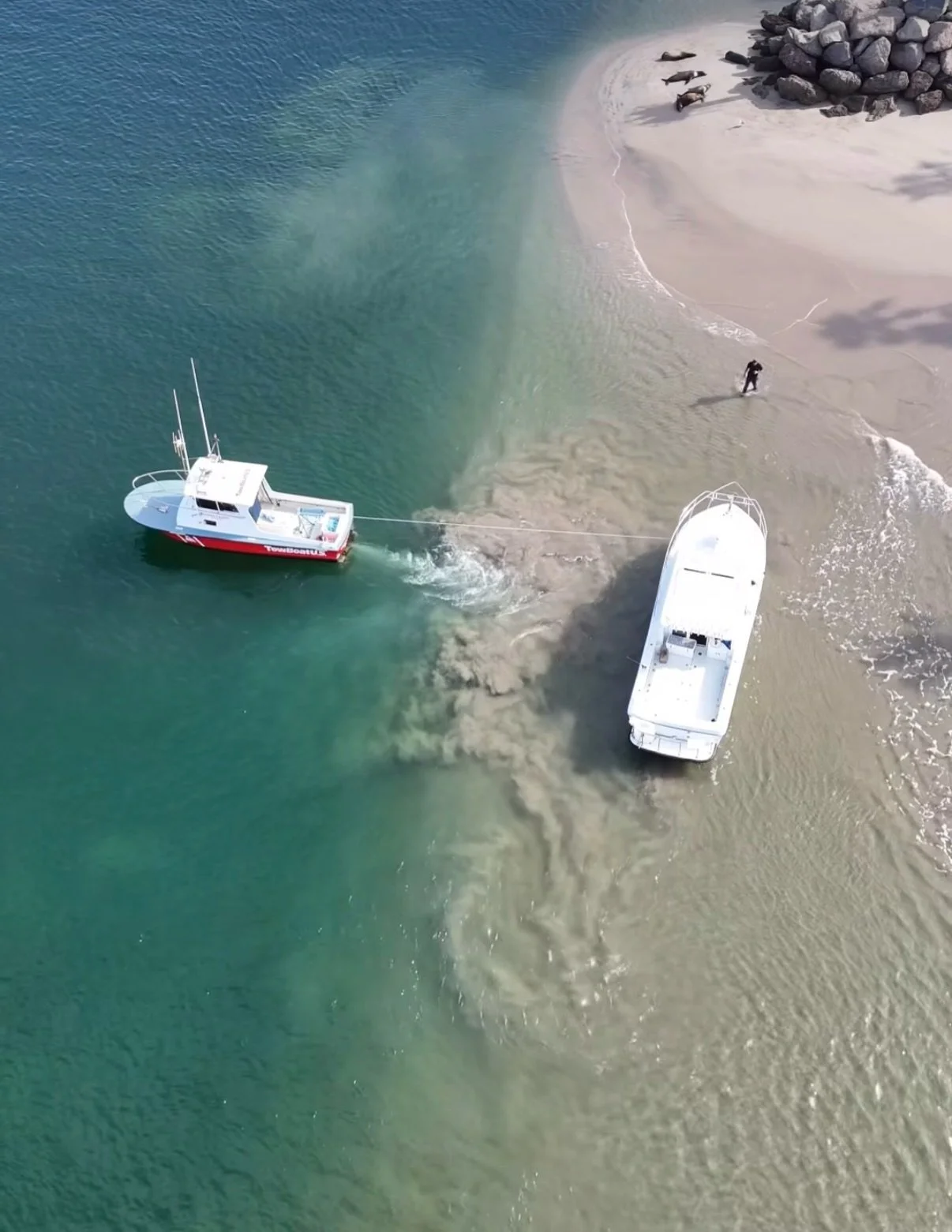 Thanks @venturacountyharborpatrol for capturing these shots from above! This vessel operator became distracted and ran aground on sandbar while entering the @channelislandsharbor &mdash; Soft ungroundings are a covered service under a @boatus members