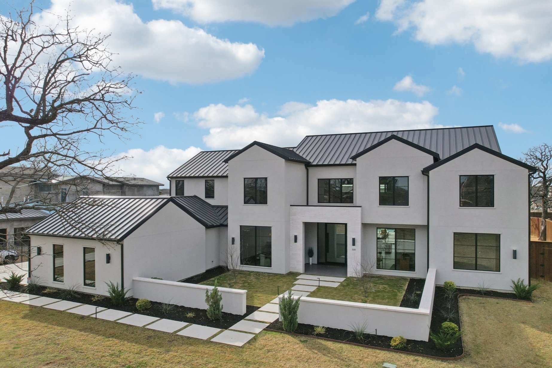 Luxury home in Southlake, Texas with modern architecture and manicured landscaping.