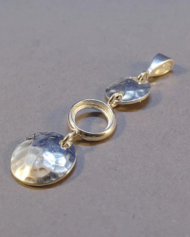 triple_hammered_surface_necklace.jpeg