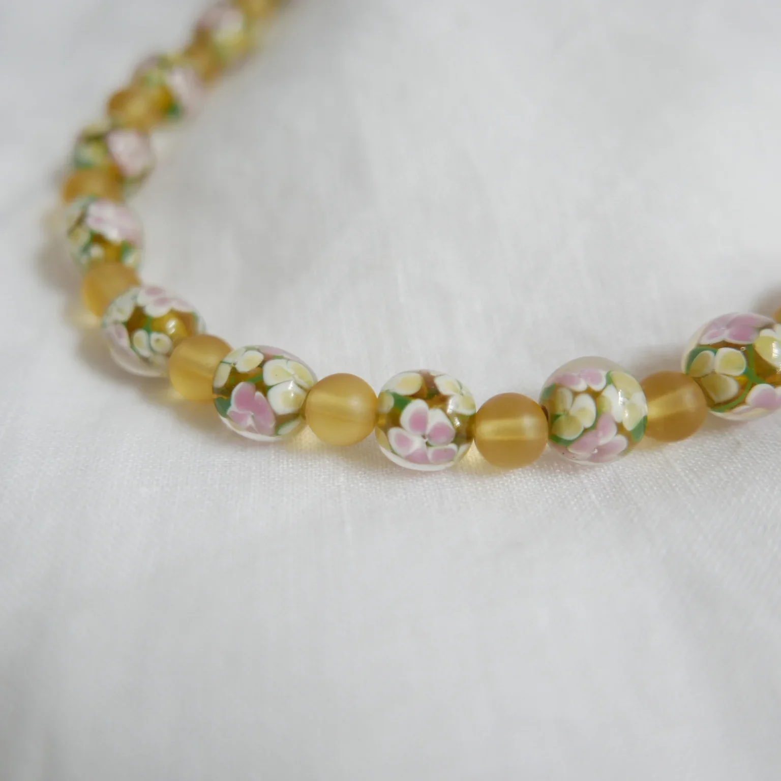 hydrangeabuttercupnecklace.webp