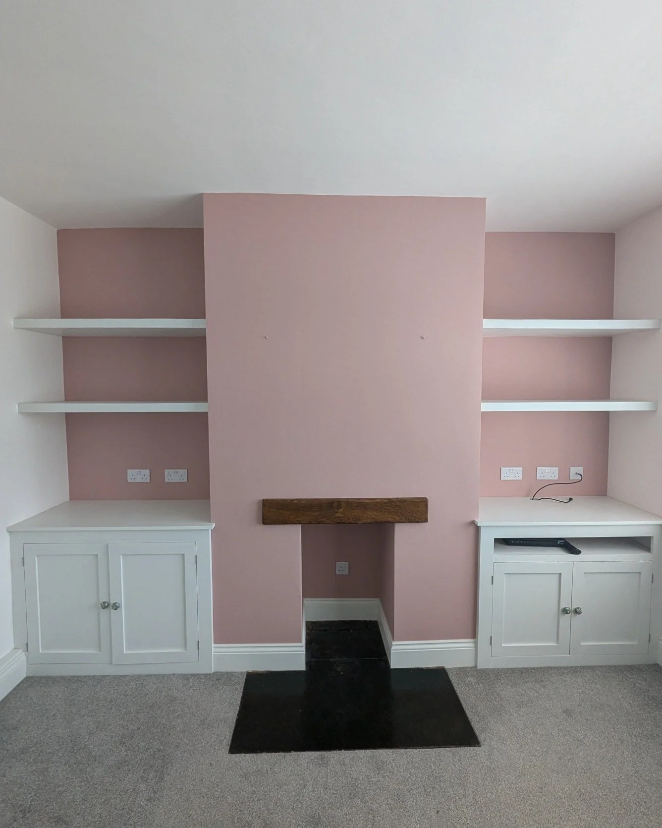 🎨✨ Another successful paint transformation completed on this feature wall! 🖌️ From  green to vibrant pink with Valspar Trade  Petal Grove, this small painting job made a huge impact for our client who wanted a quick change before their new sofa arr