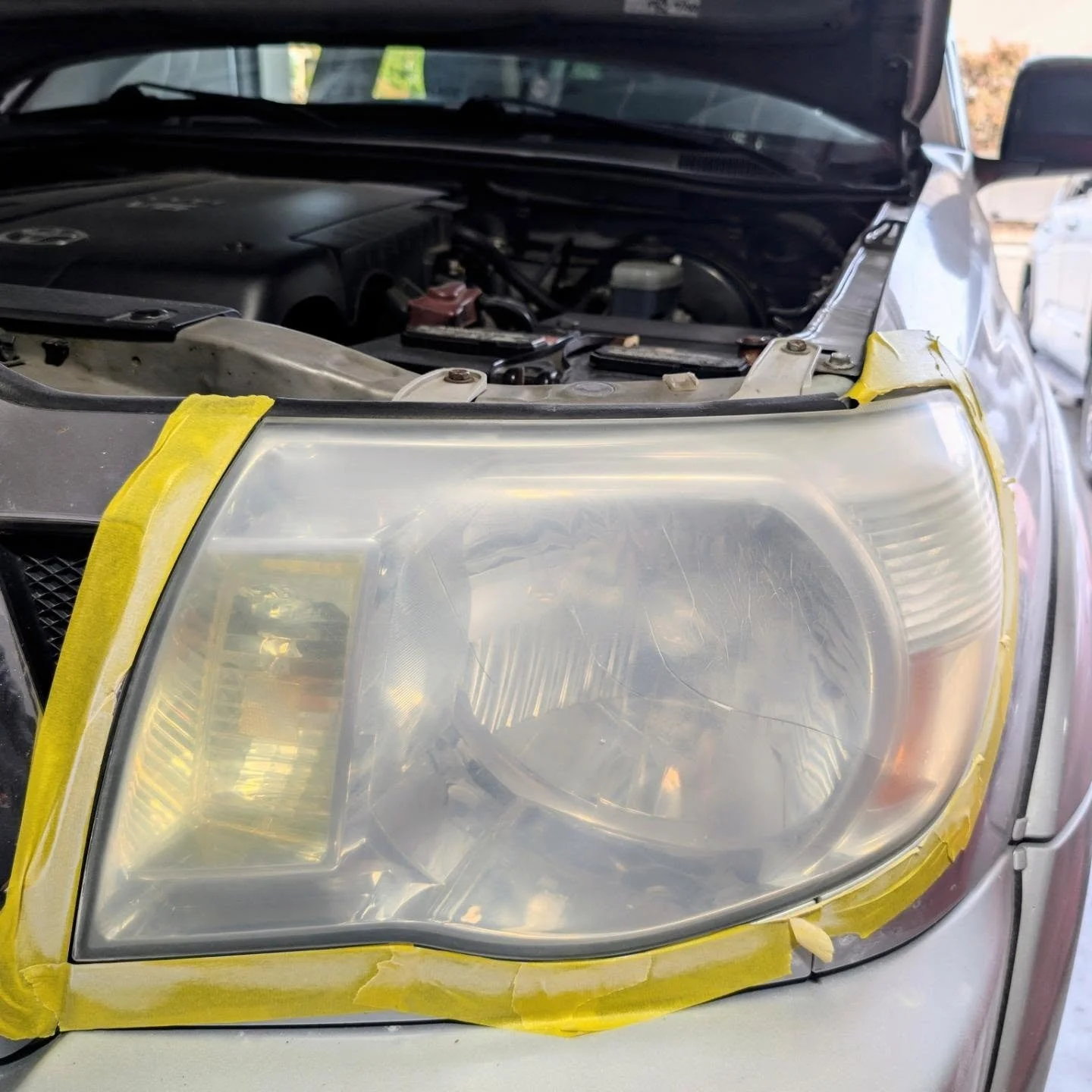 2005 Toyota Tacoma SR5 headlight restoration before