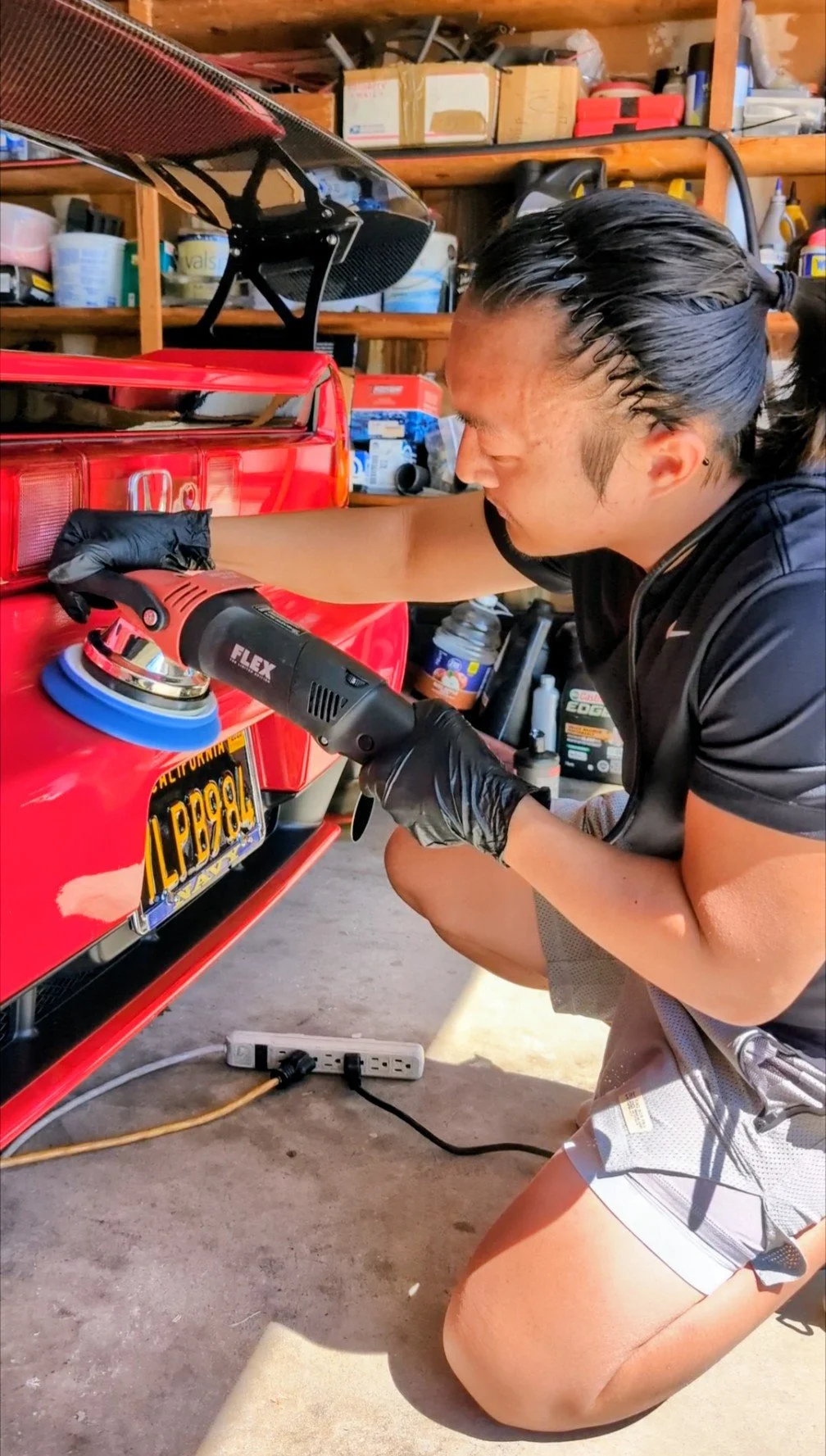Detailer polishing 1991 Acura NSX