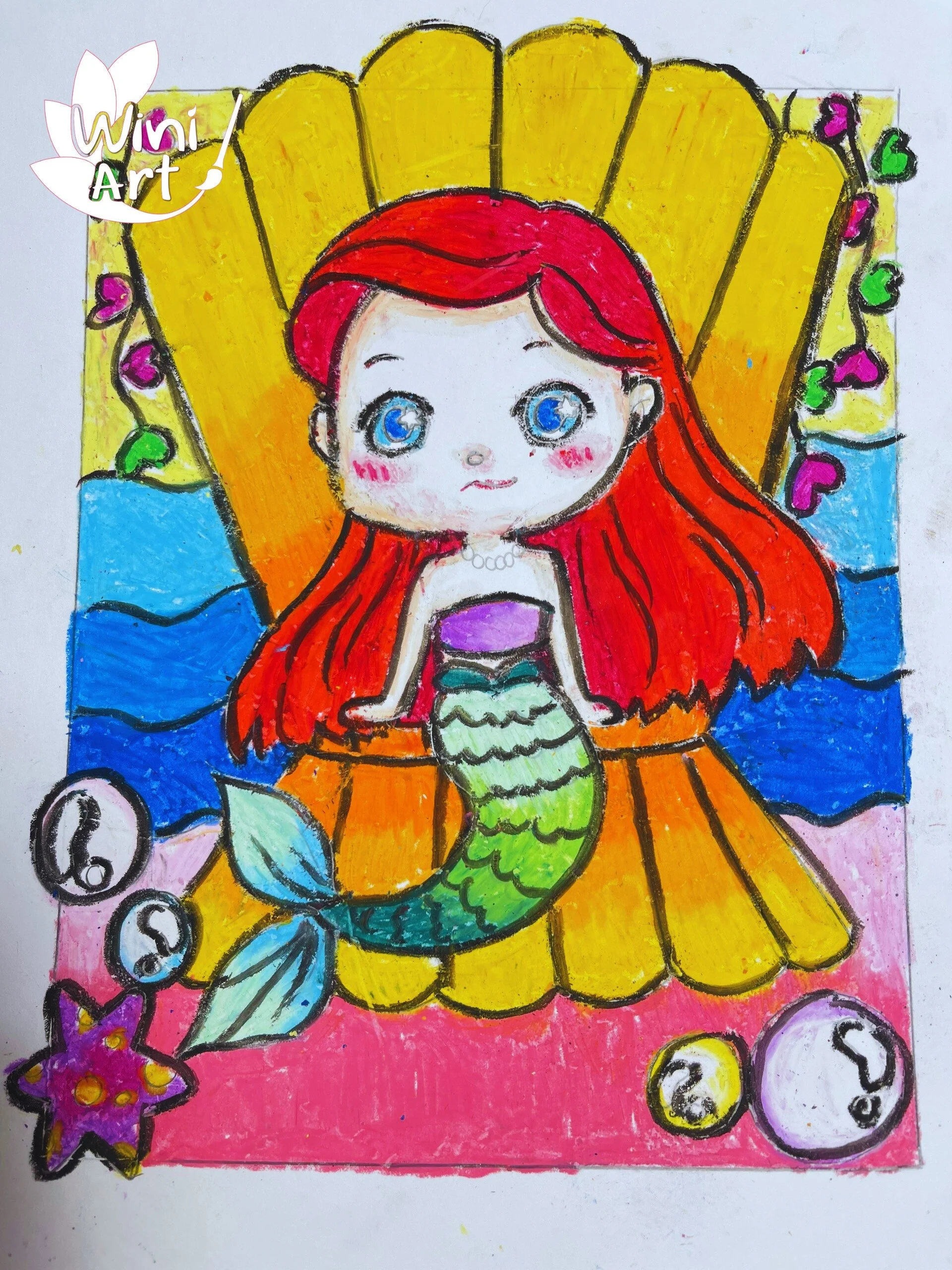 Colorful drawing of a mermaid with red hair, sitting inside a large yellow seashell. The background is pink with decorative stars, hearts, and question mark symbols.