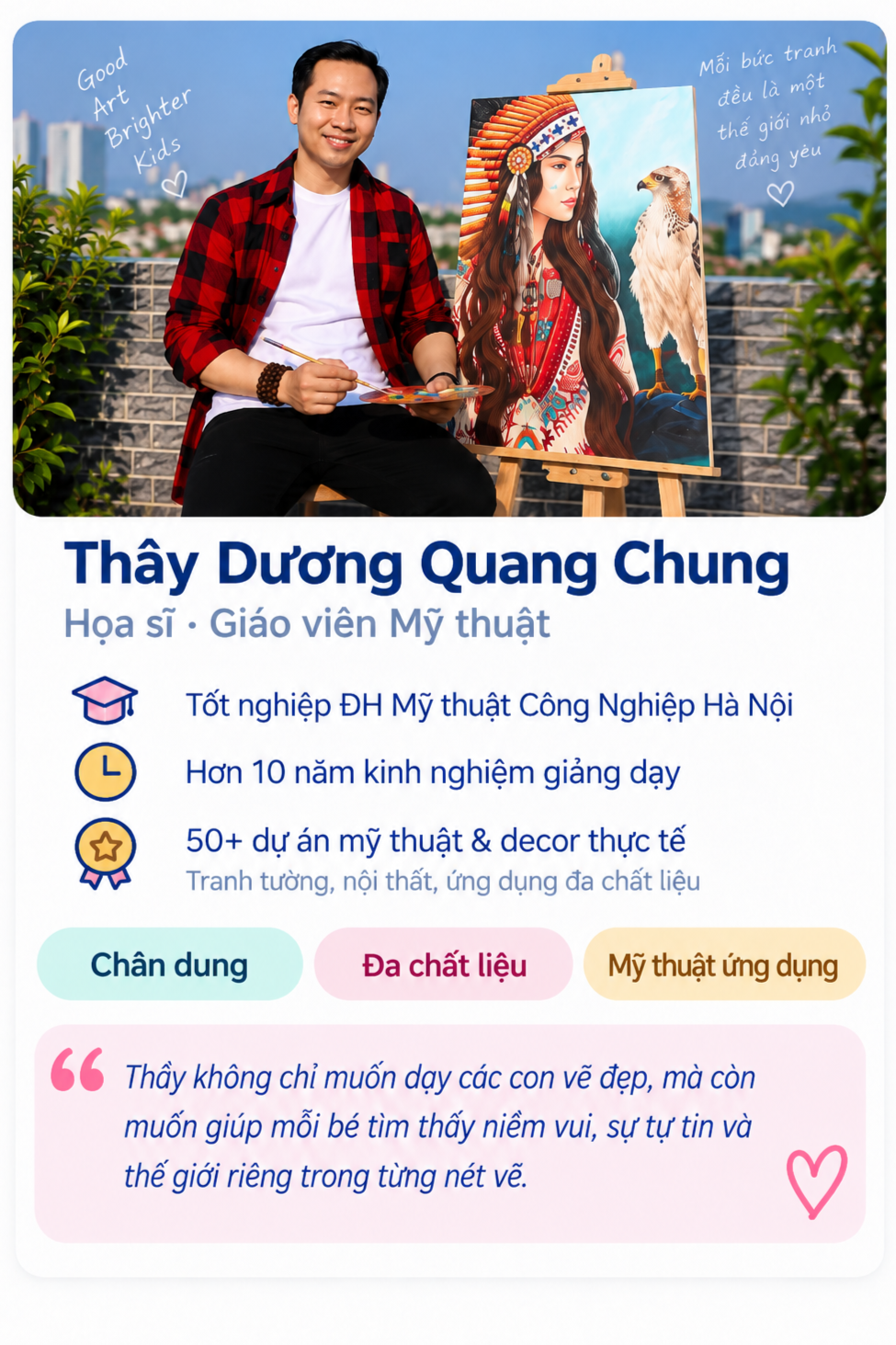 A smiling male art teacher sitting outdoors, holding a palette and brush, with a bright, colorful painting of a woman in a Native American headdress and an eagle on an easel beside him. The background shows a clear blue sky and cityscape. Handwritten text on the image reads 'Good Art Brighter Kids' and a quote in Vietnamese.