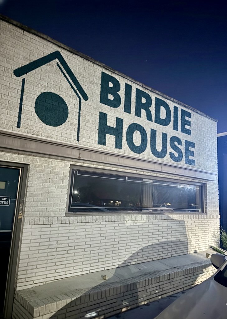 Birdie House Golf Club exterior signage at Dallas Uptown location