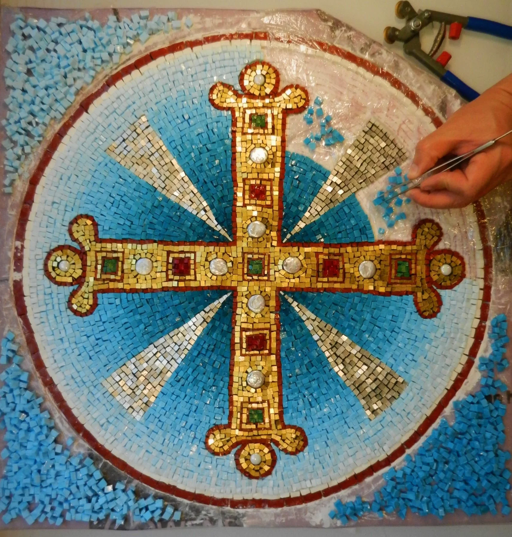 cross bell tower making hands.jpg