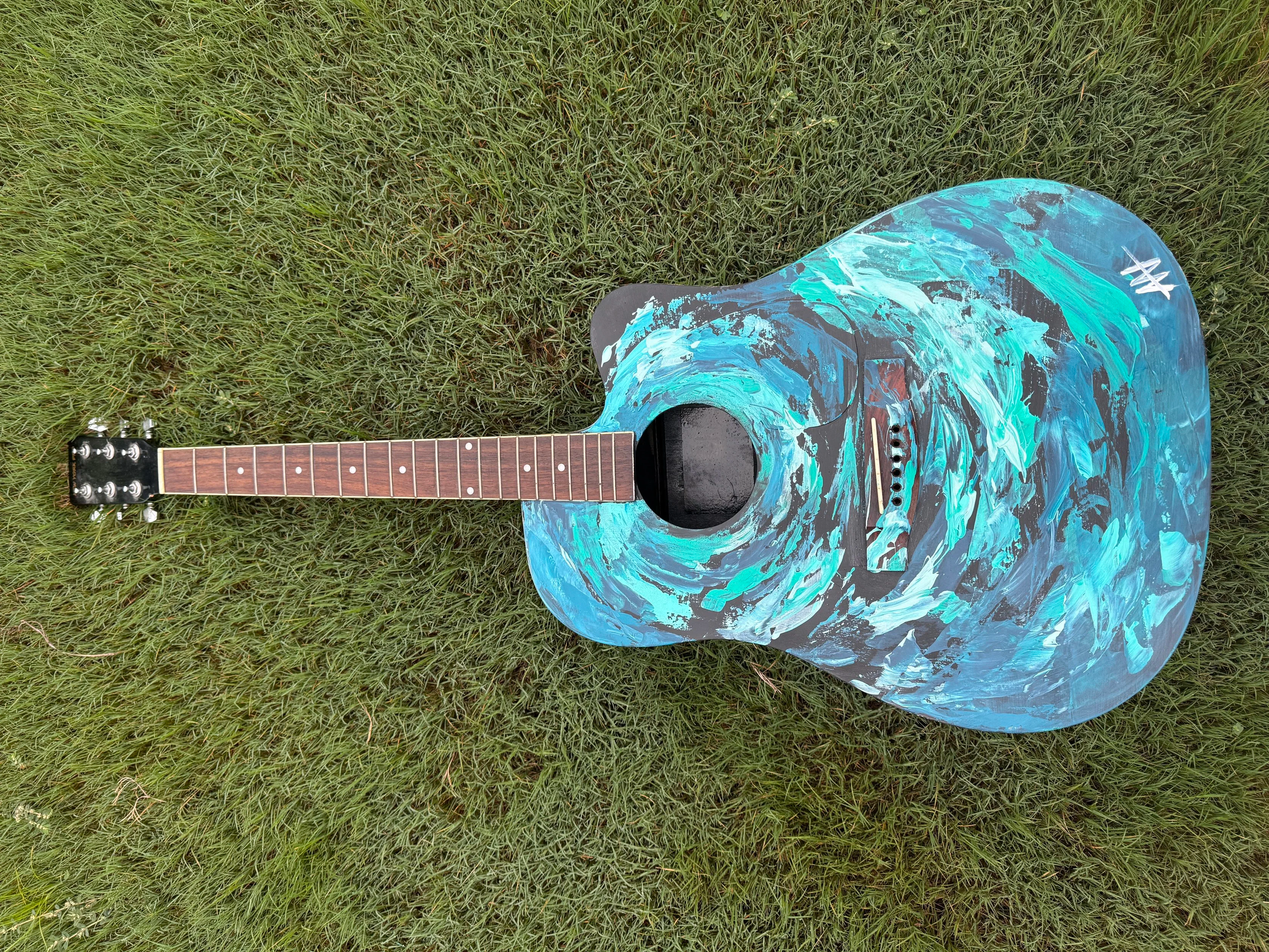 Custom painting of a guitar commissioned artwork by Amanda Ray Newman