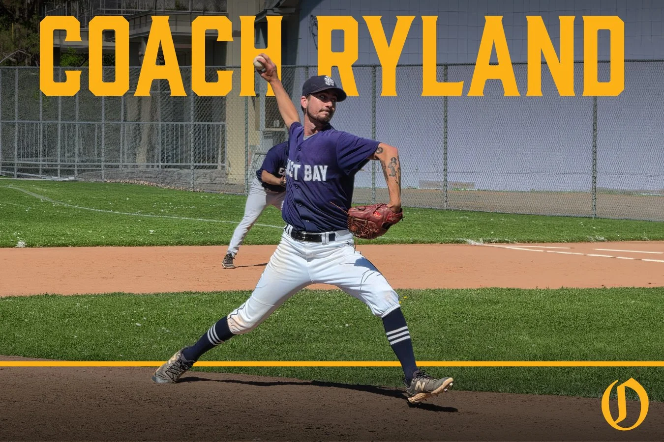 A man with dark hair, a goatee, and a mustache, wearing a black T-shirt, looking at the camera with a neutral expression. Behind him is a gray background with yellow text that reads 'Coach Ryland' at the top, and a small yellow logo in the bottom right corner.