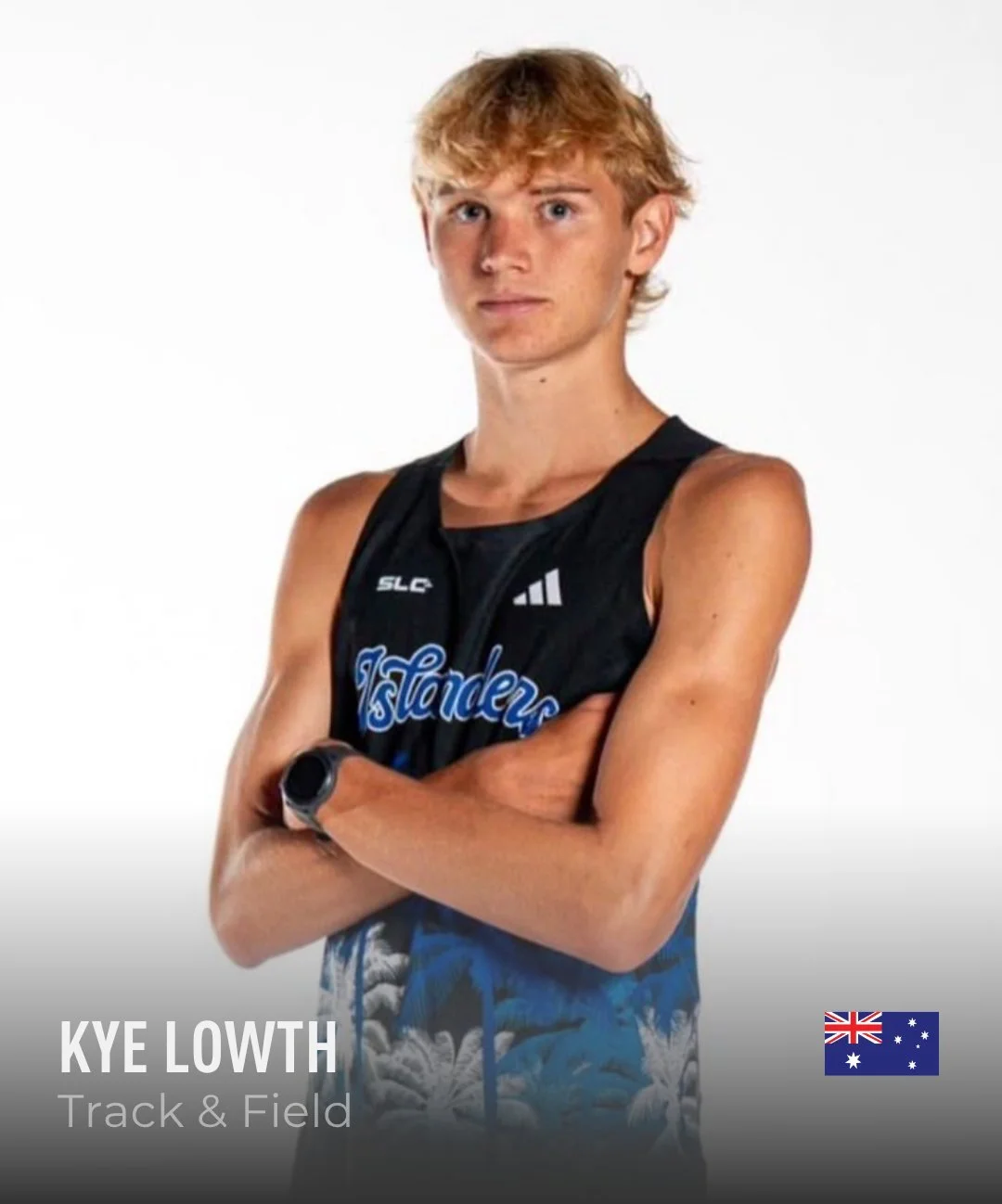 A young male athlete with short red hair standing with arms crossed, wearing a black sleeveless sports jersey with Australian flag and text 'KYE LOWTH Track & Field'.