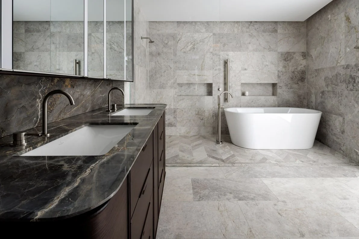 An image of the renovated marble bathroom.