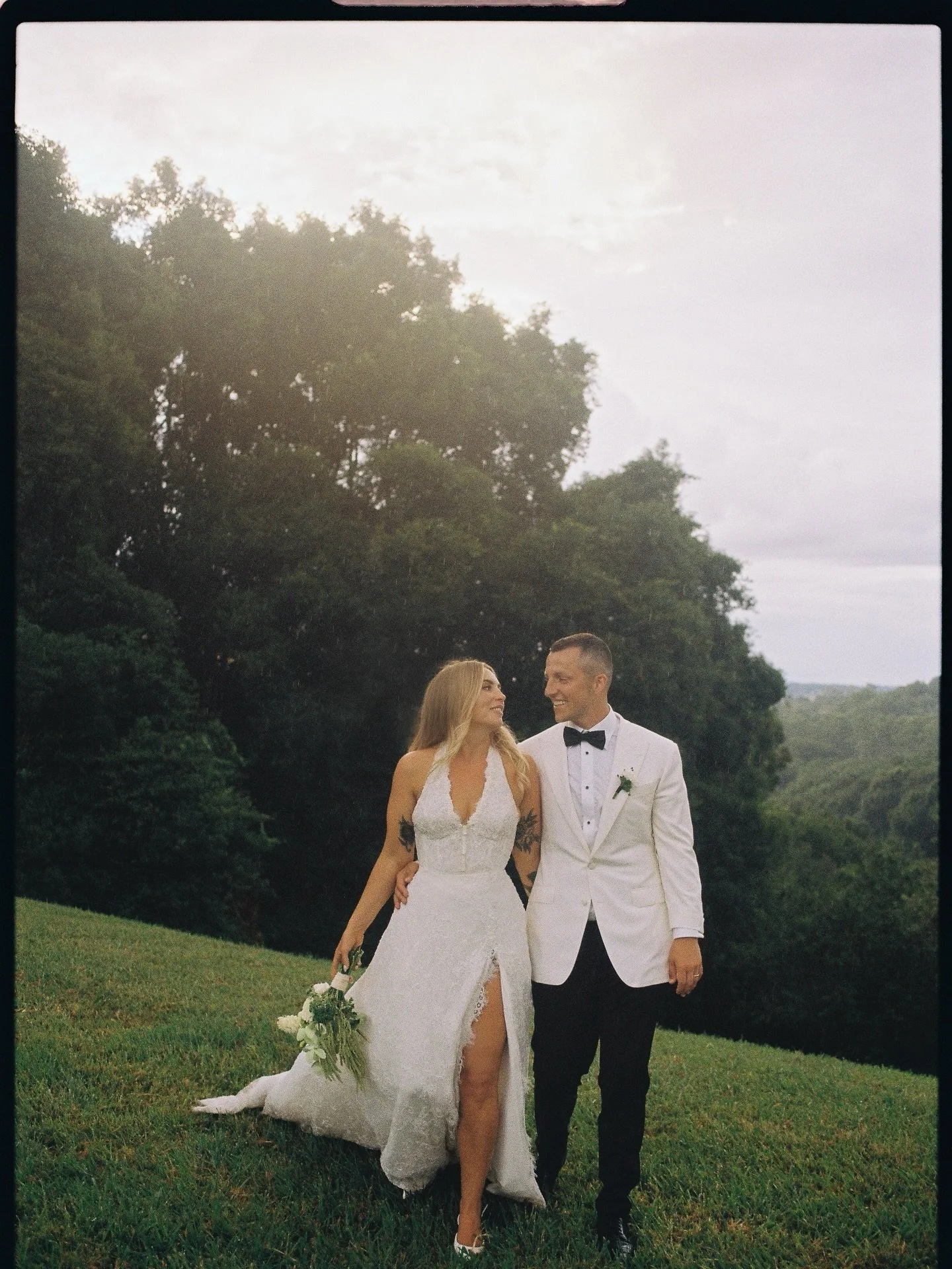 Film, lace &amp; love 🖤

Bride @harrietmgregory in one of a kind @gp.creatives 

Photo @brendan_back 
Venue @nuttinghill_ 
Florals @flwr_studio 
Makeup @mercedesedmondsmua 
Hair @amyspryhair 

#custombridal #bridalreimagined #halterneckweddingdress 