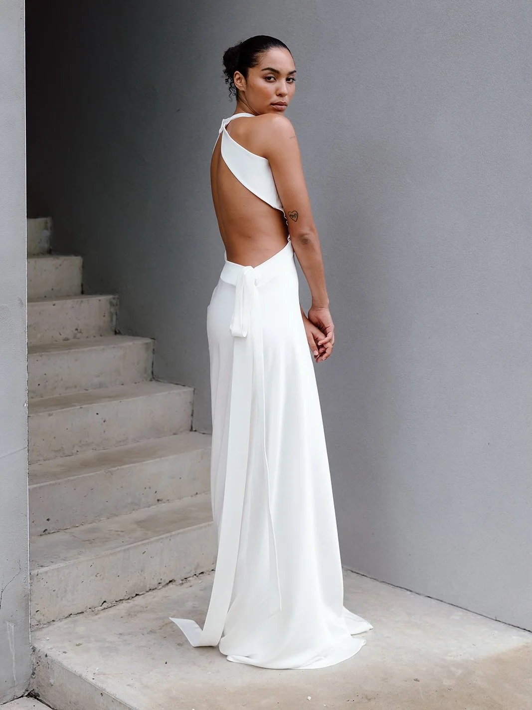MEET EVIE

A new interpretation of a crowd favourite @gp.creatives original. The Evie is a bias cut gown in our classic Japanese satin back crepe, with matte contrast elements, asymmetric neckline and contemporary cut outs. 

Available now exclusivel