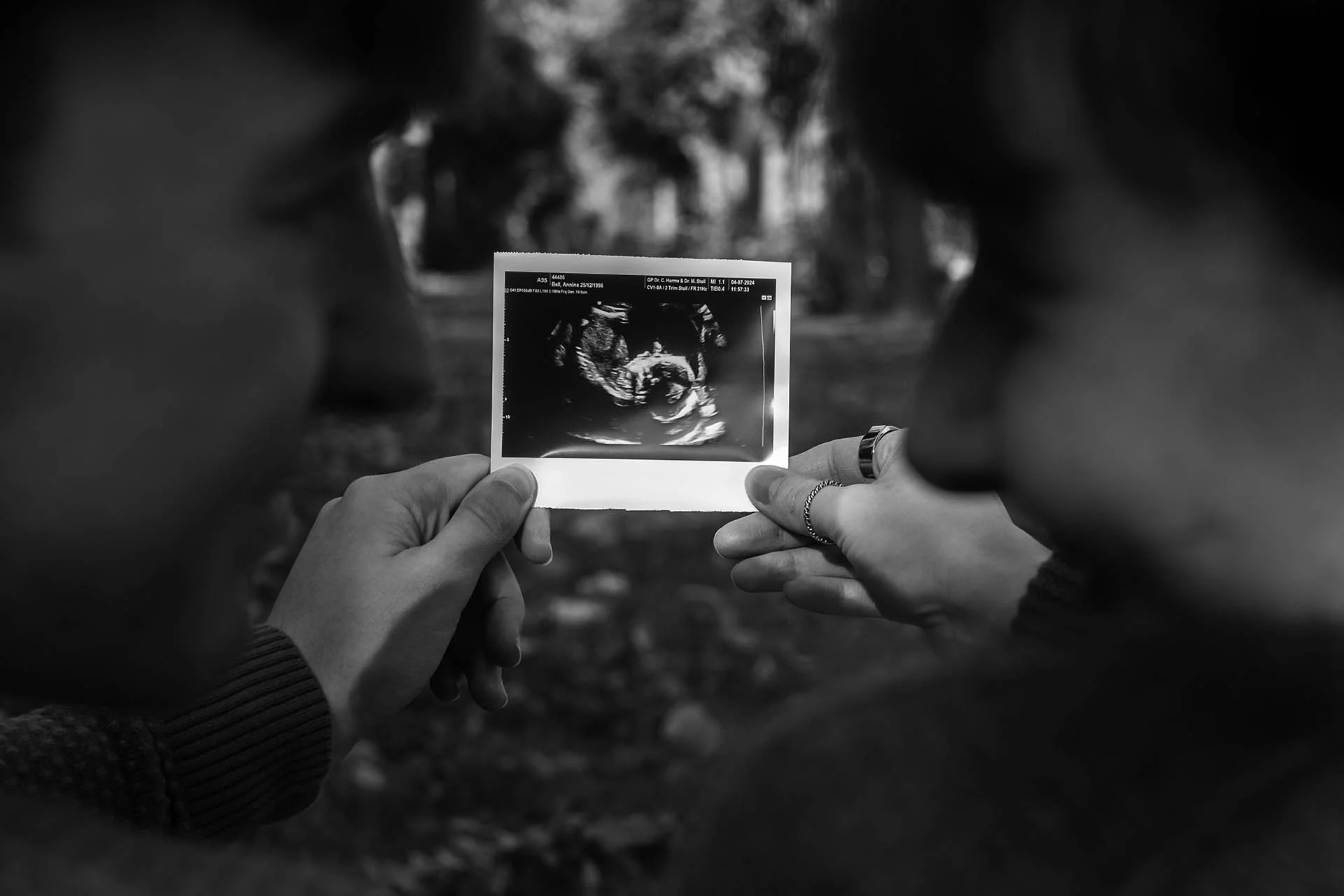 Expecting Couple Holding Ultrasound - Maternity Journey in Berlin.jpg