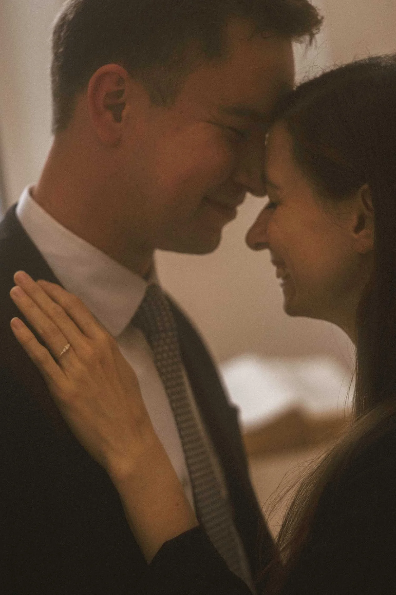 Intimate close up of couple touching foreheads during romantic Berlin portrait photoshoot
