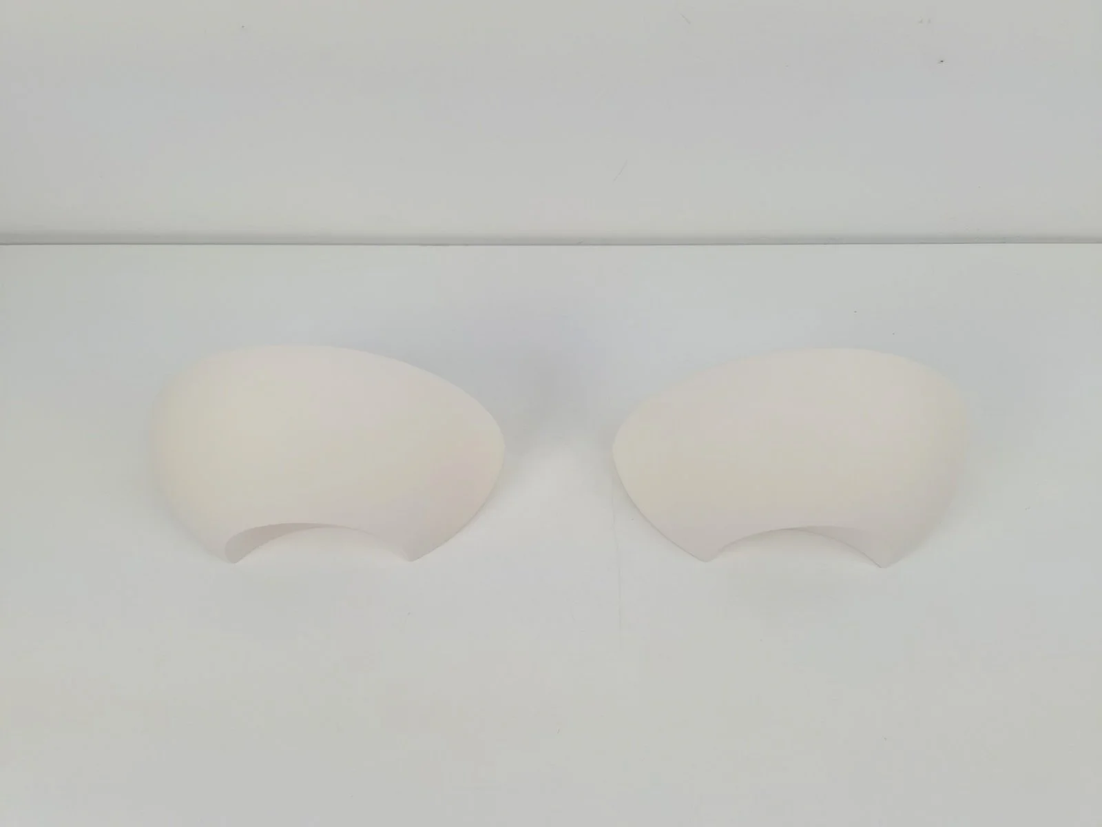 Pair of Atelier Sedap semi-circular plaster wall lamp, 1990