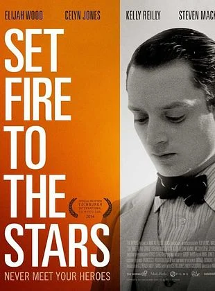 Movie poster for "Set Fire to the Stars" featuring Eljah Wood, Kelly Reilly, and Steven Mackintosh. Produced by Andy Evans