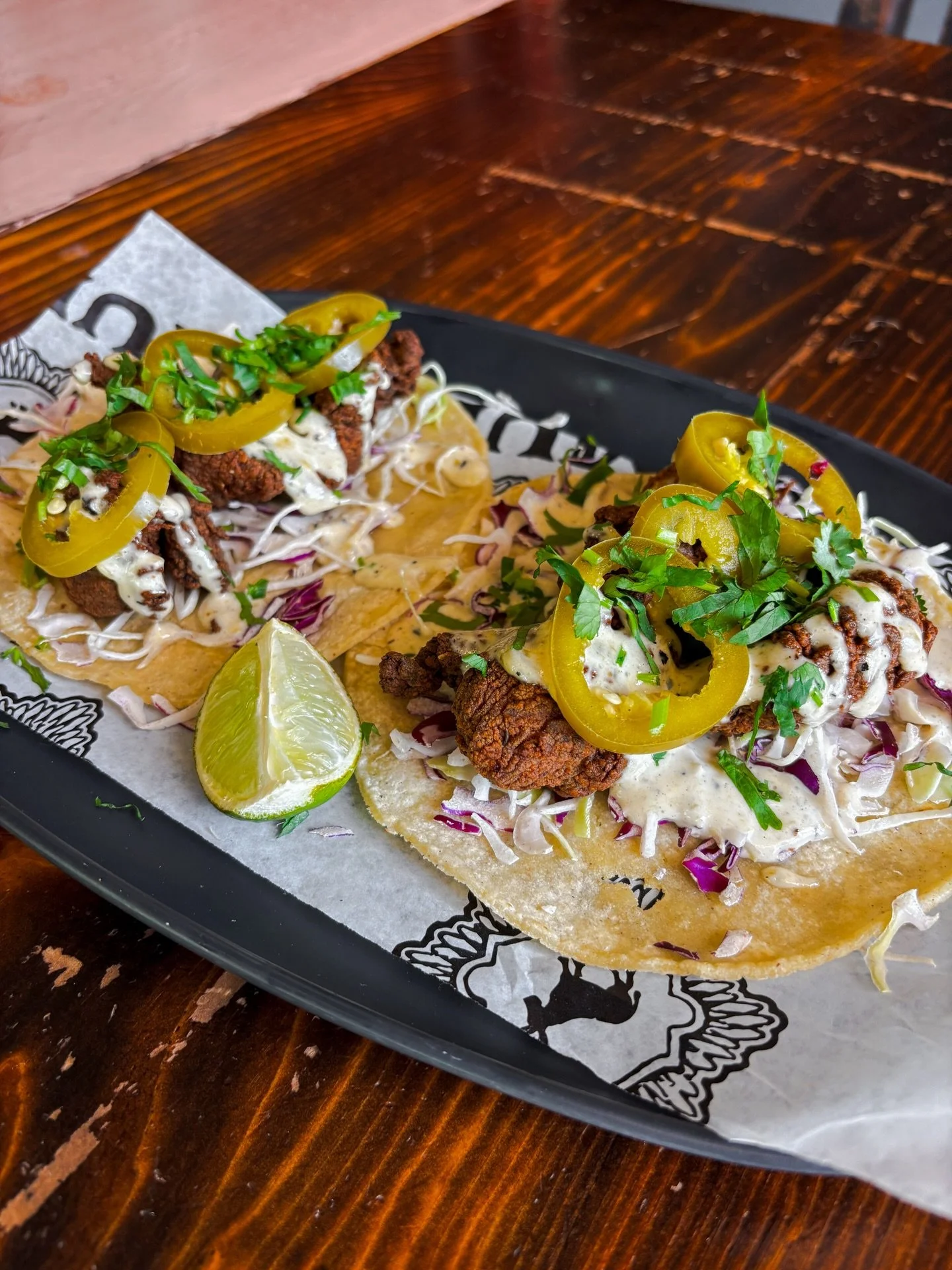 A brand new, never-before-seen, Thursday special! Fried Chicken Taco! Buttermilk-brined fried chicken, jalape&ntilde;o-lime aioli, cabbage, pickled jalape&ntilde;os, and cilantro on a corn tortilla. Today only!