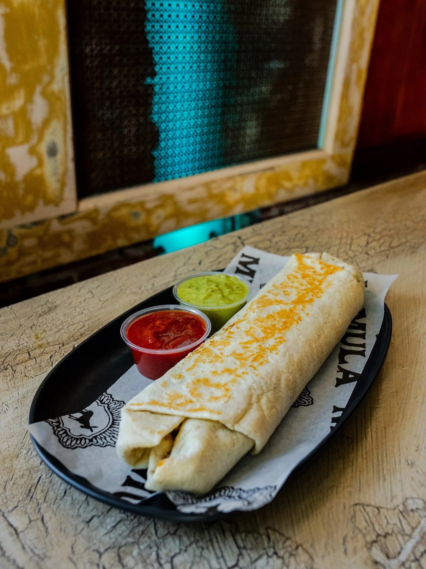 Juarez-style burritos today! Your choice of carnitas, barbacoa, chicken, or rajas wrapped up with refried beans and a queso oaxaque&ntilde;o blend on a fresh plancha-grilled flour tortilla. Today only!