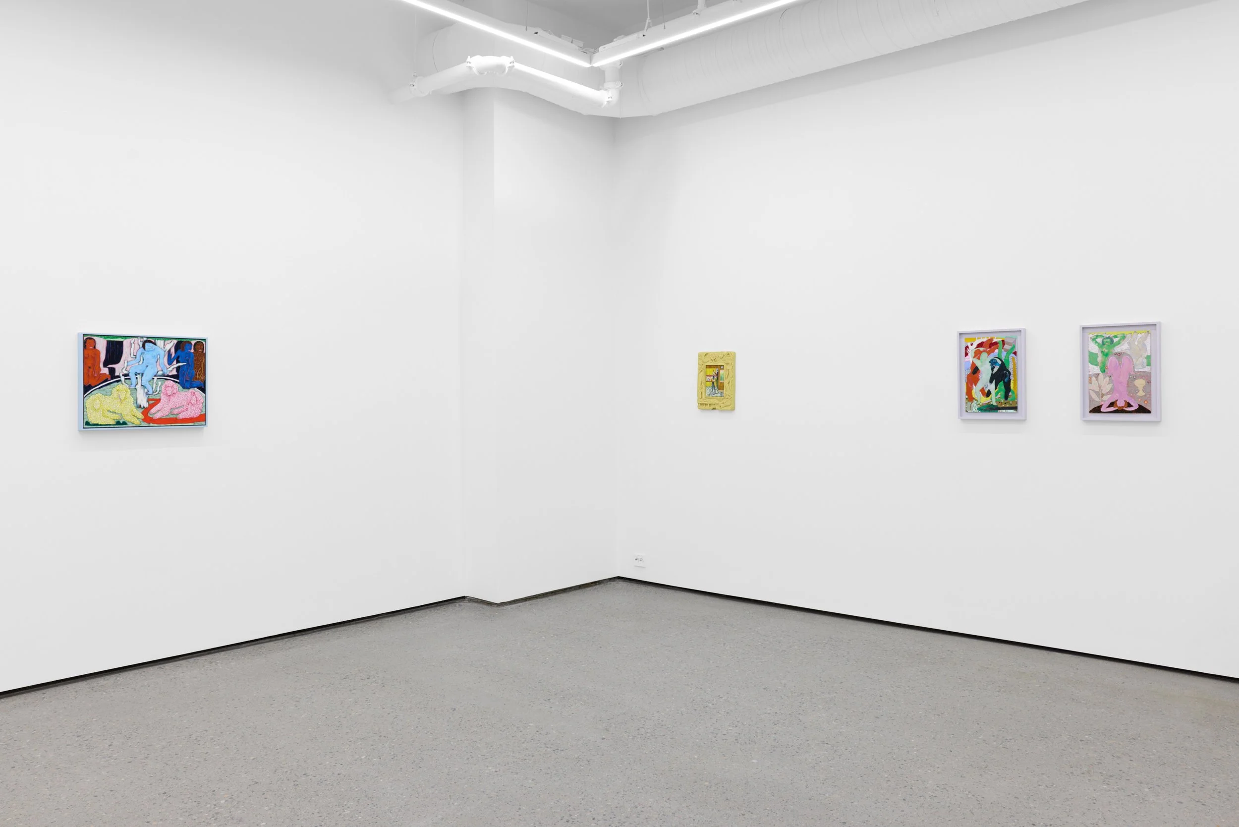 Gallery with four colorful abstract and figurative paintings displayed on white walls and gray flooring.