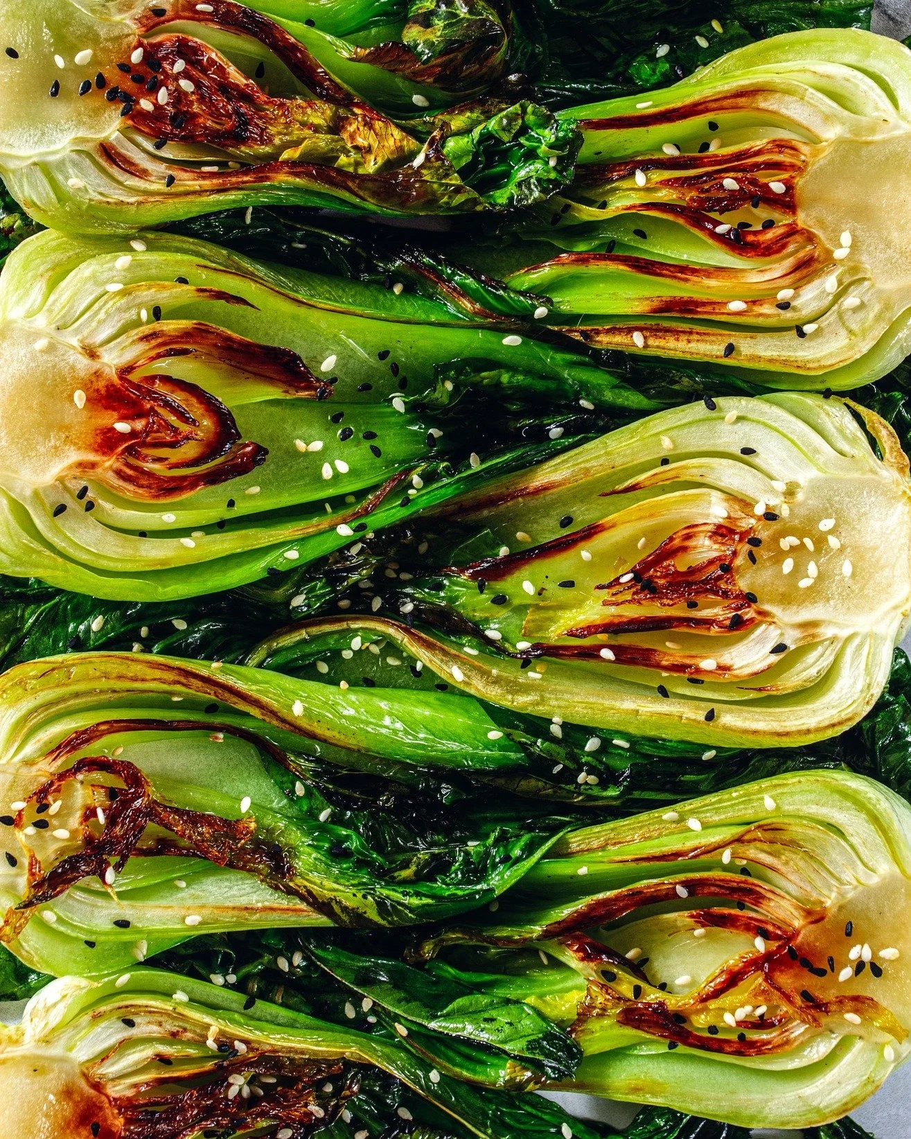 Simple. Fresh. Authentic. Grilled bok choy, lightly charred, sprinkled with sesame seeds and a touch of spice. Pure flavour, straight from the field to your plate.

At The Plant Based Traders, we supply fresh, natural bok choy, perfect for dishes tha