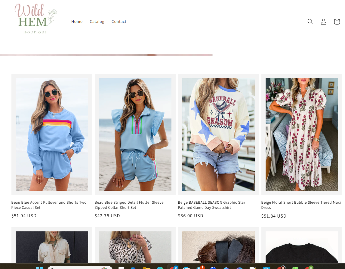 Online boutique website displaying casual and fashion outfits, including blue athletic set, striped flutter sleeve set, baseball graphic sweatshirt, floral maxi dress, and other clothing items.