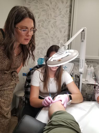electrolysis student practicing electrolysis under supervision