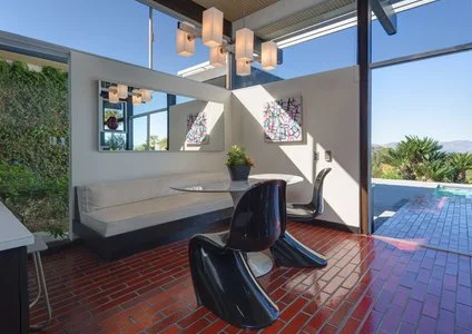 04c15d6a0b044ebb_8874-w424-h300-b0-p0--the-scheimer-house-architects-richard-and-dion-neutra-1972.jpg