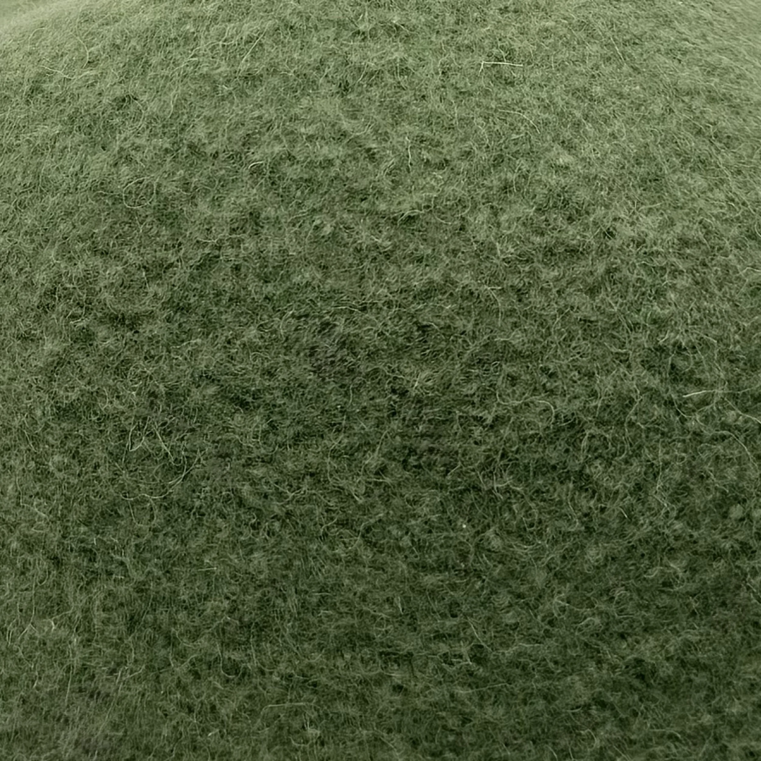 Bondon tall wool cap in Fir Green, texture view