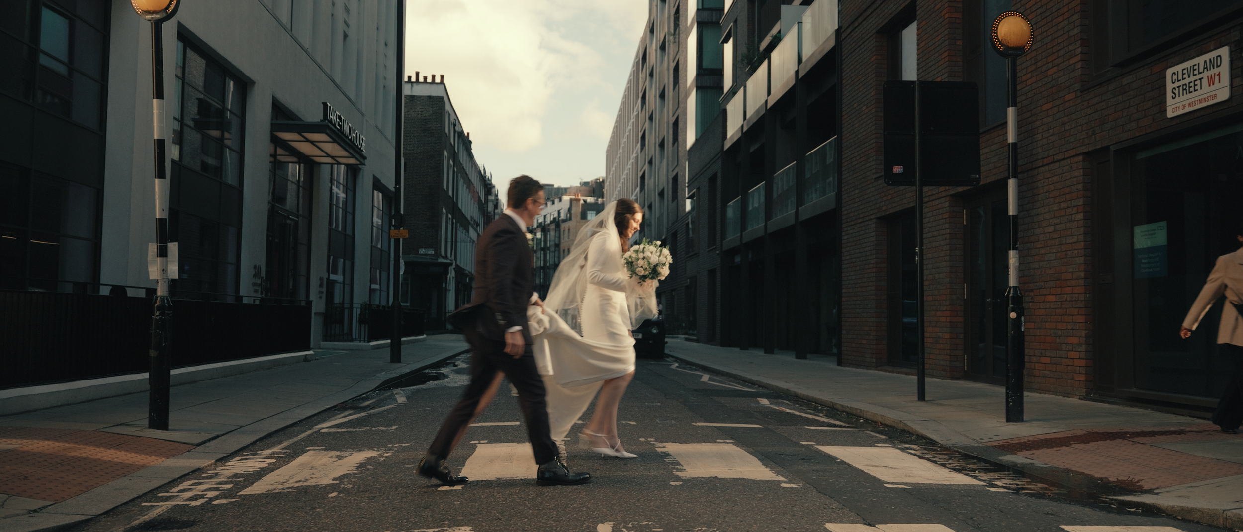 London elopement couple walking near Old Marylebone Town Hall after ceremony