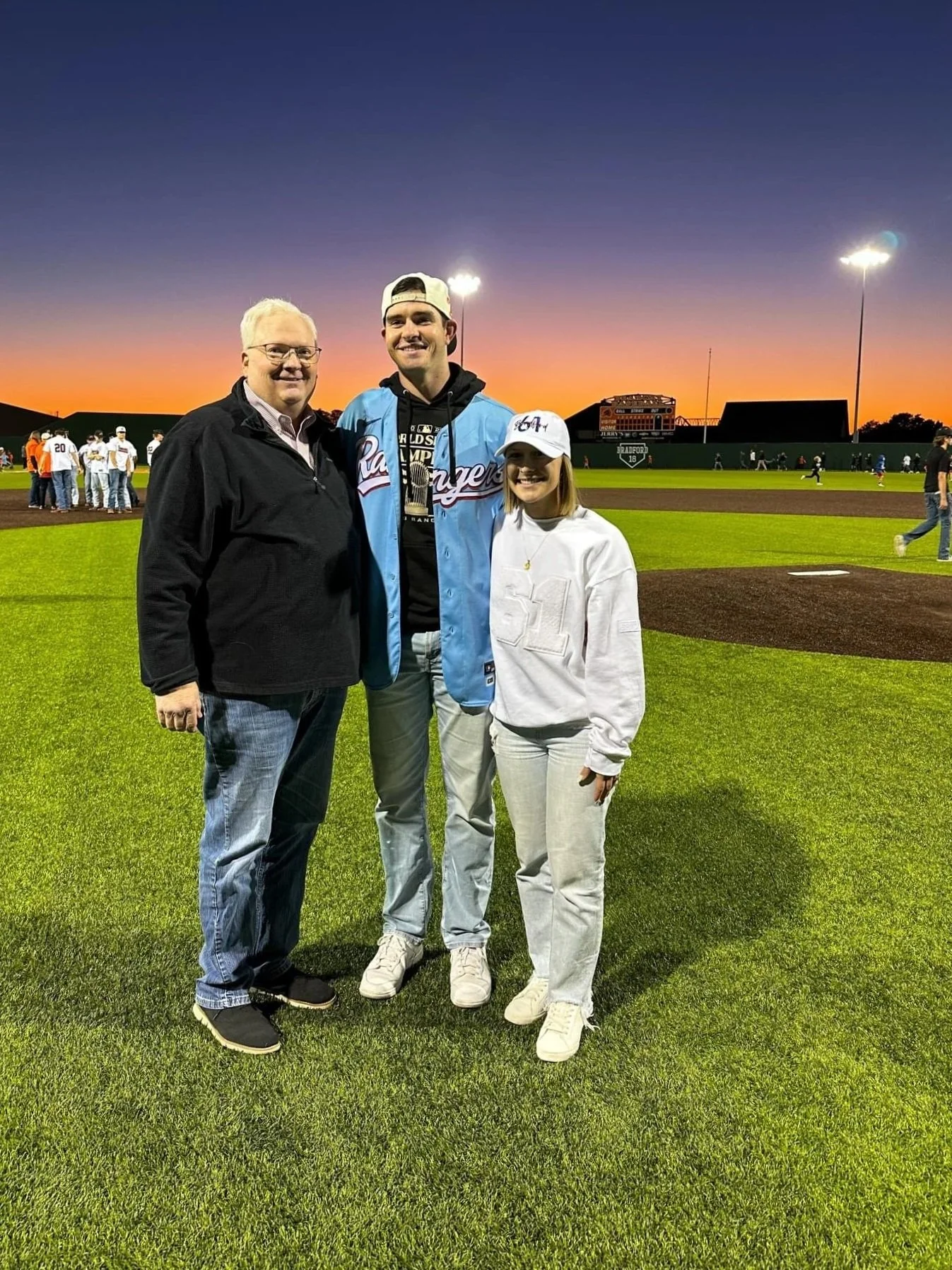 Joe with Cody Bradford and his lovely wife on Cody Bradford Night in Aledo, Texas; a celebration of Aledo's own World Champion.