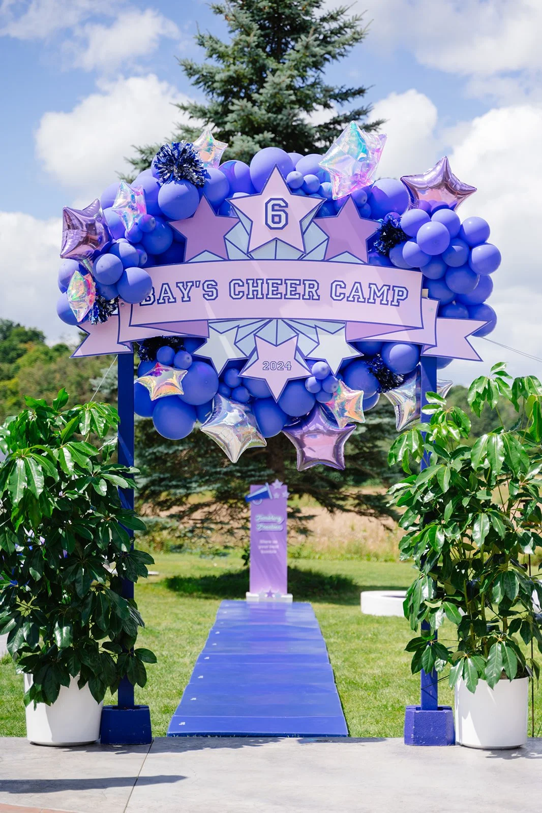 A birthday party decorated with live plant rentals