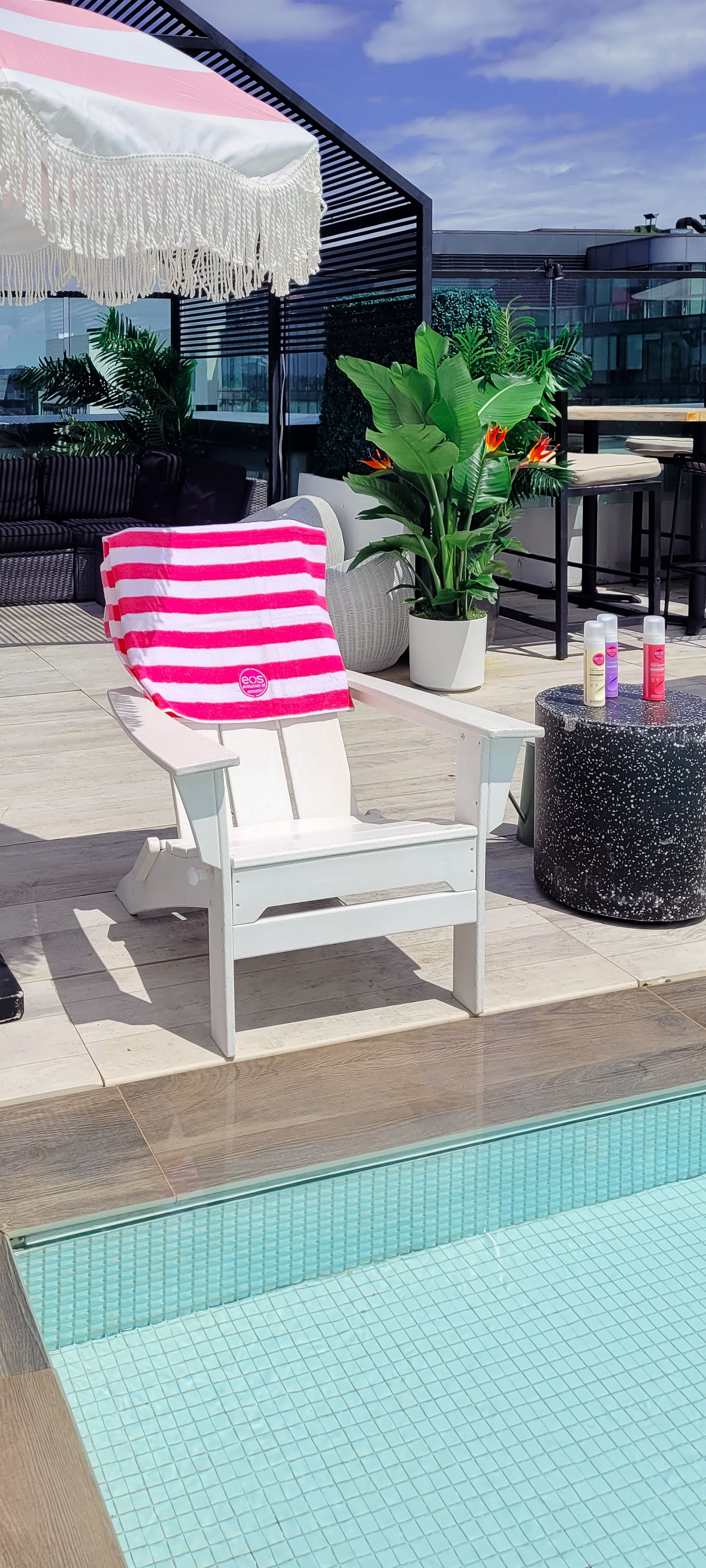 A pool side influencer event, staged and decorated with live plant rentals