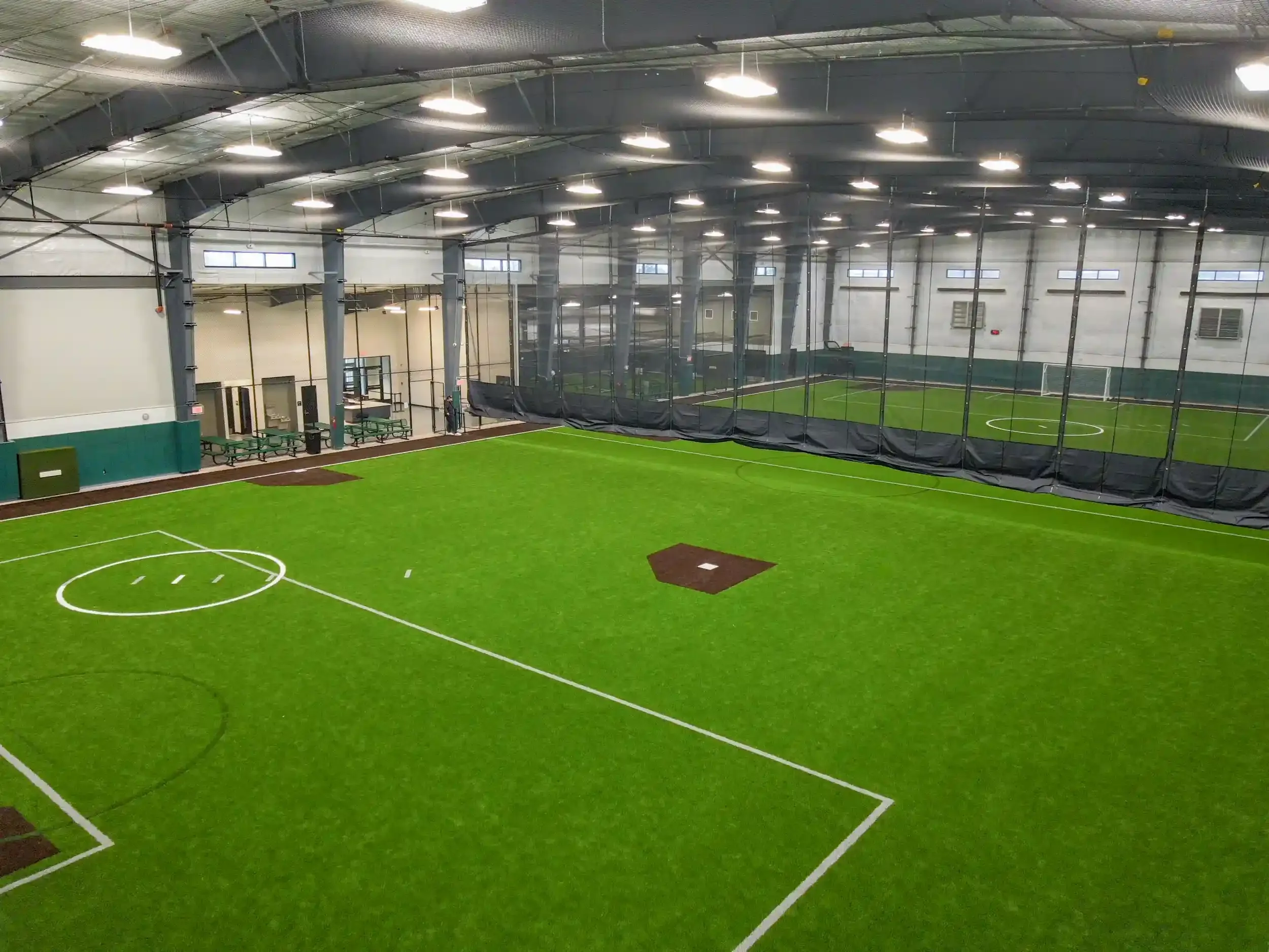 Batting cages inside the new Thomas M. Fieldhouse built for the City of Buffalo at Shoshone Park.
