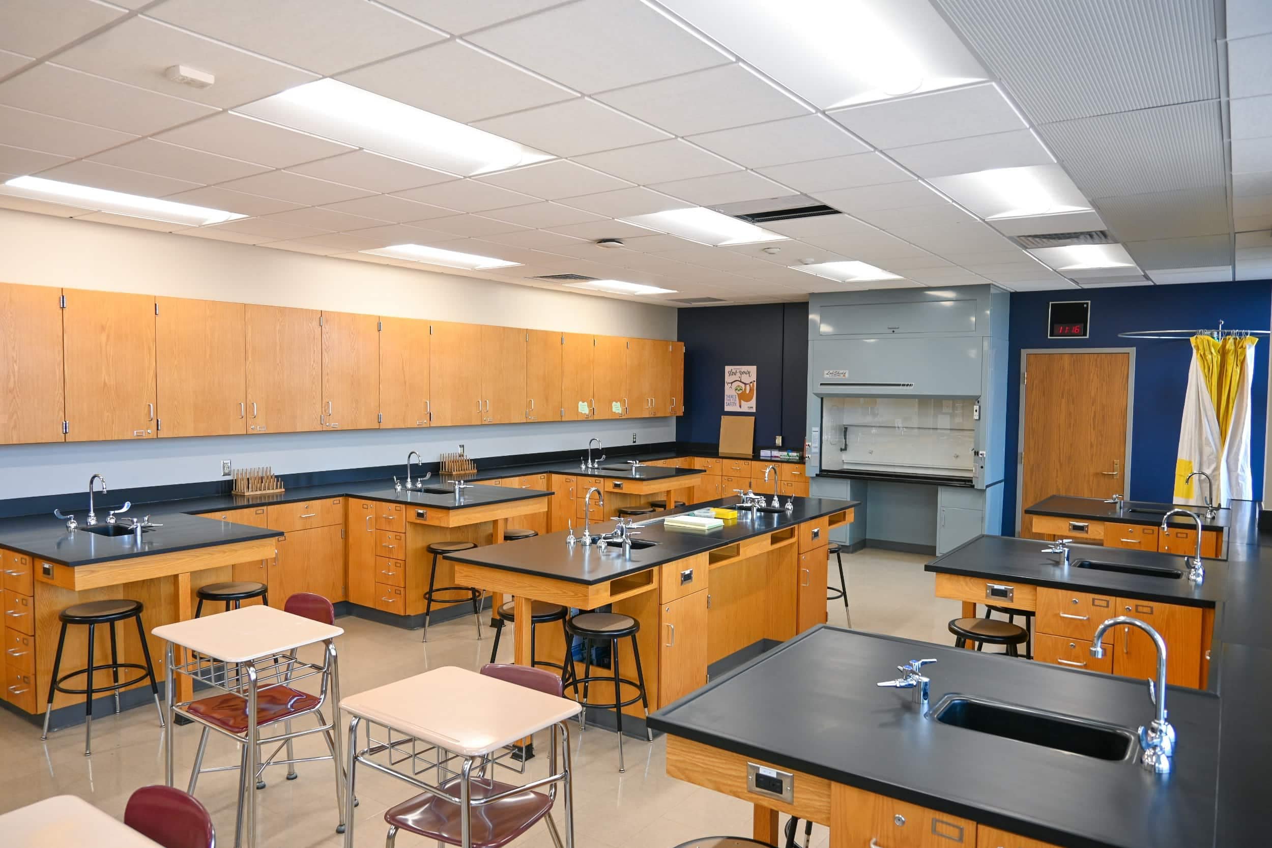 A classroom with stool seating