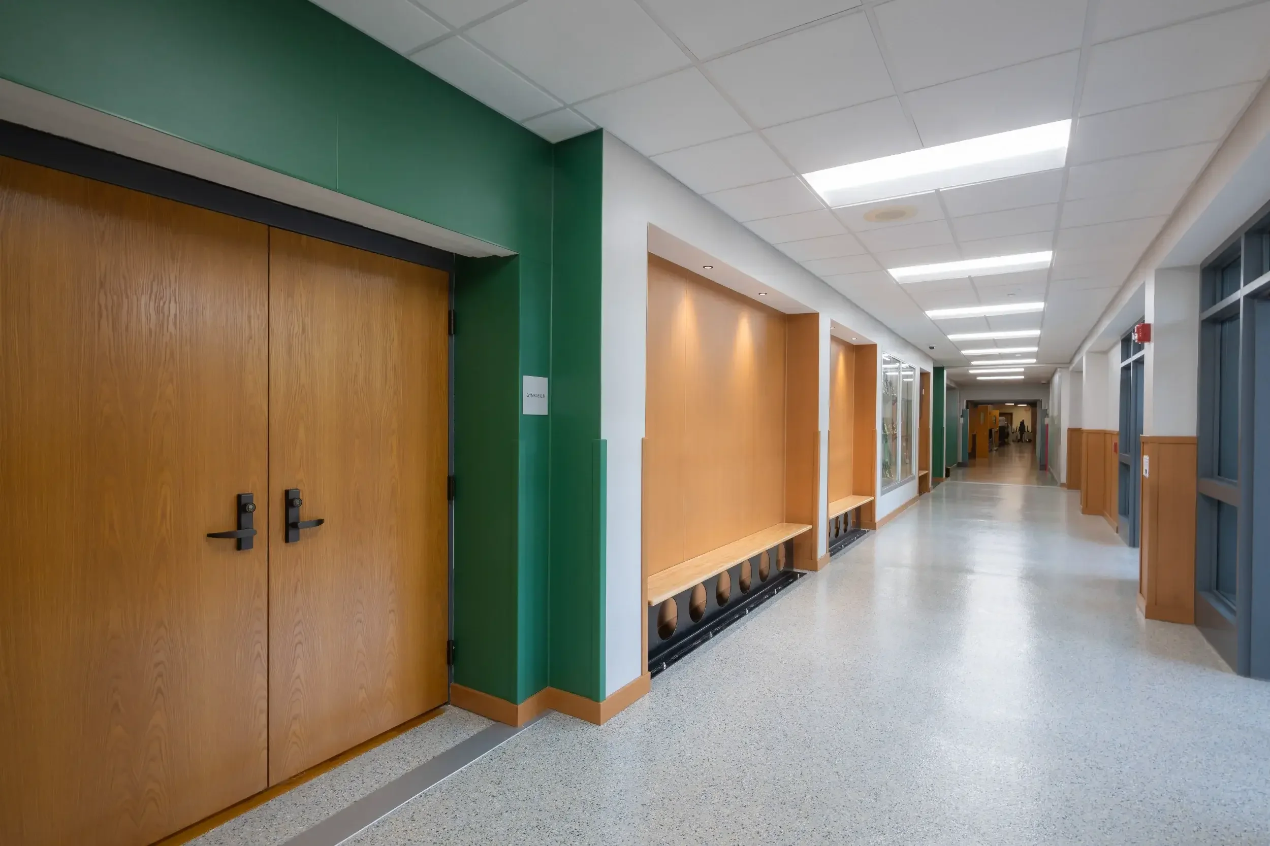 A hallway past the athletic entry doors