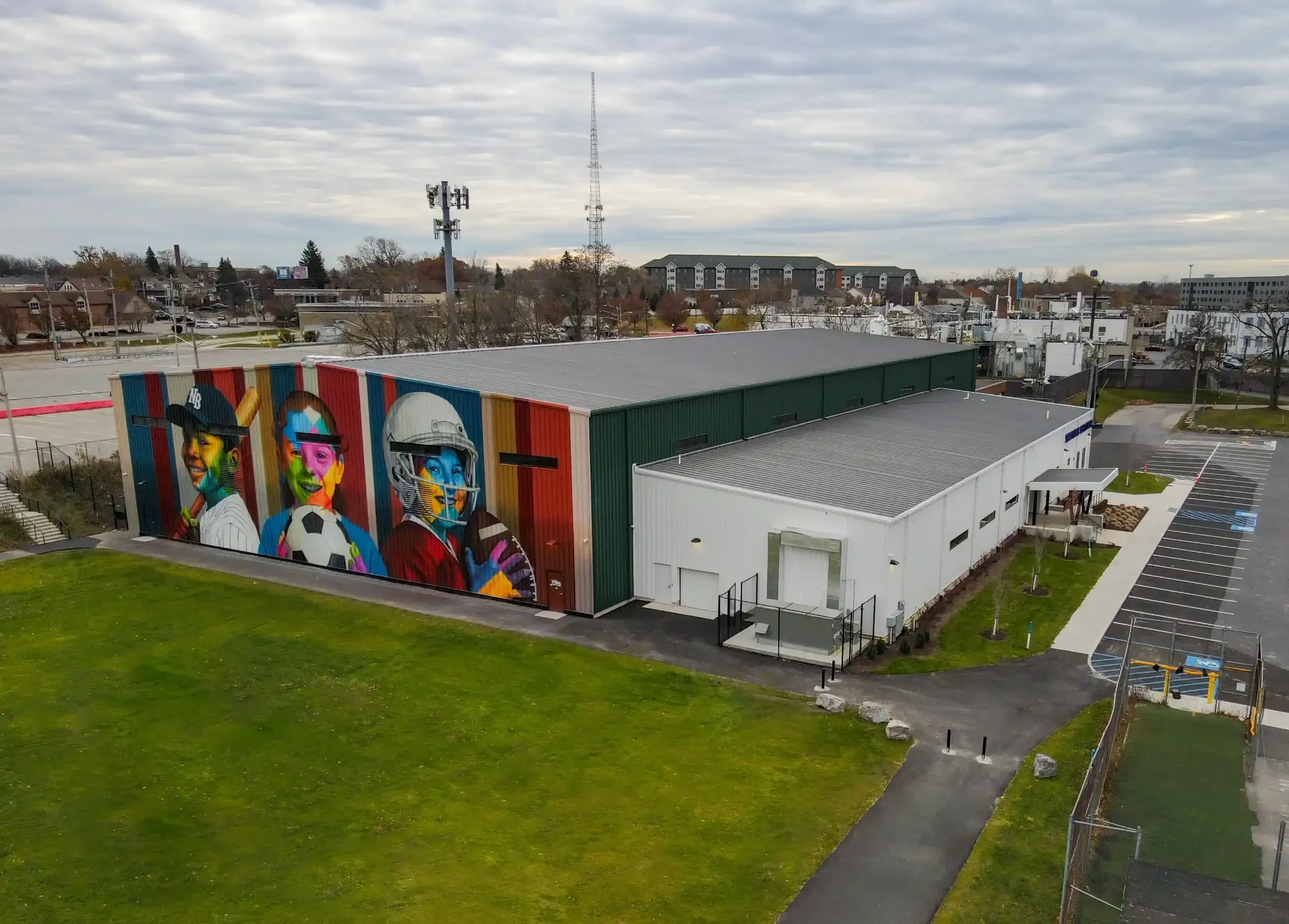 A mural on the exterior of the new Thomas M. Fieldhouse built for the City of Buffalo at Shoshone Park.
