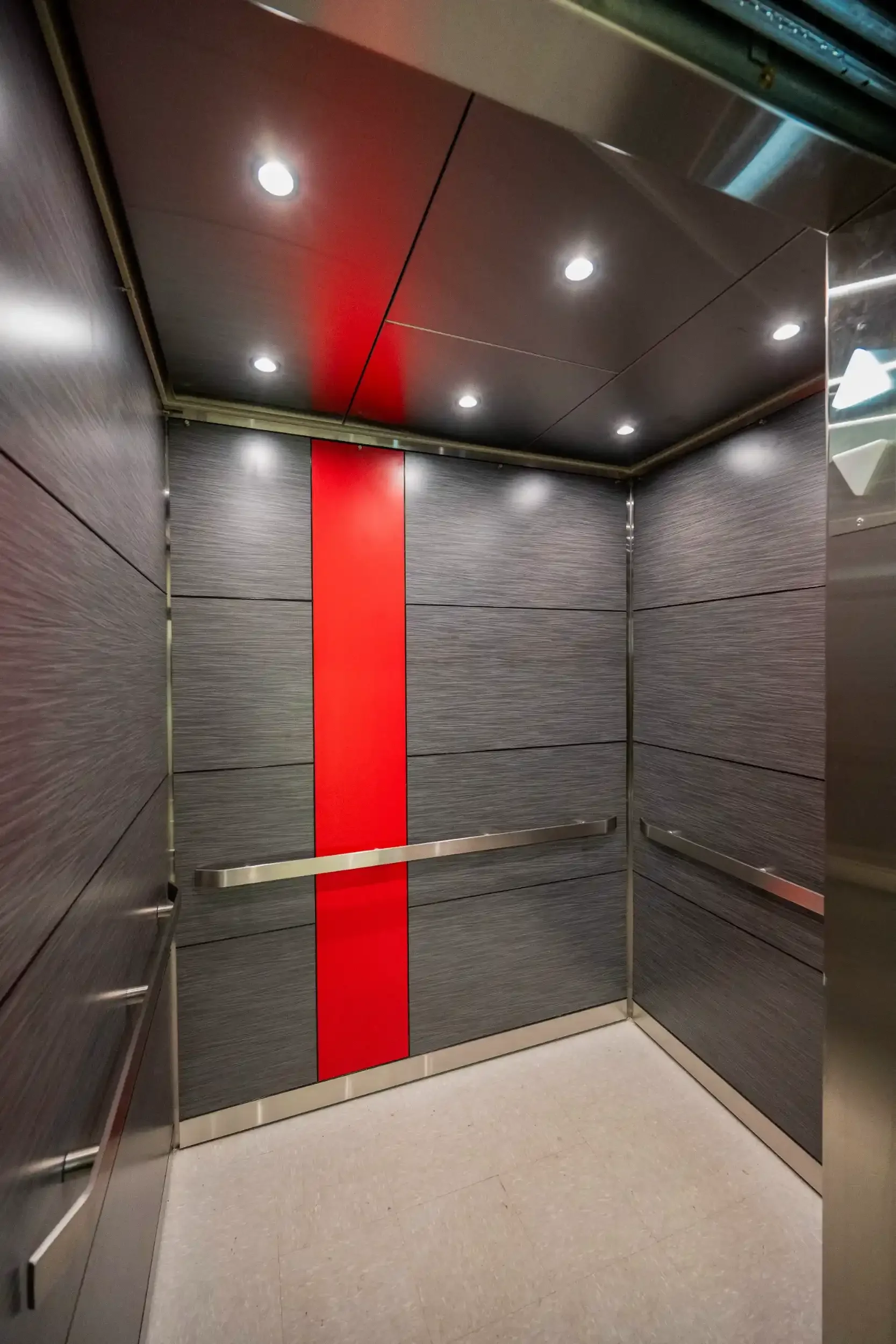 The interior of a new elevator in school colors at Bemus Point CSD.
