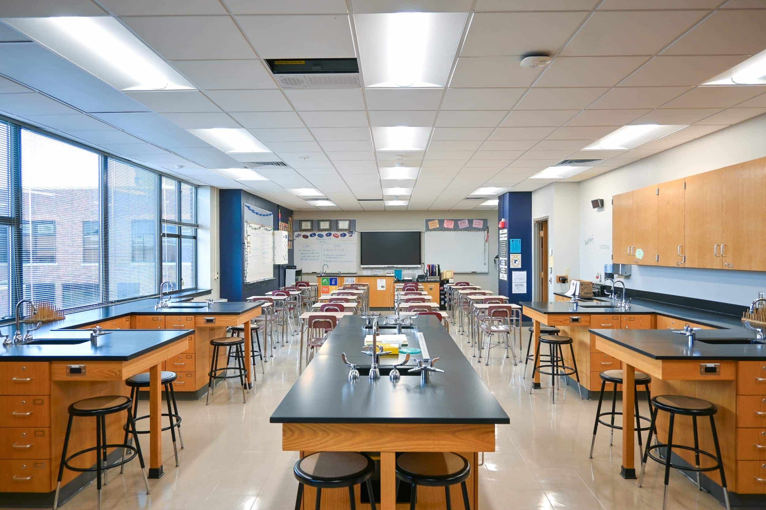 A classroom with stool seating