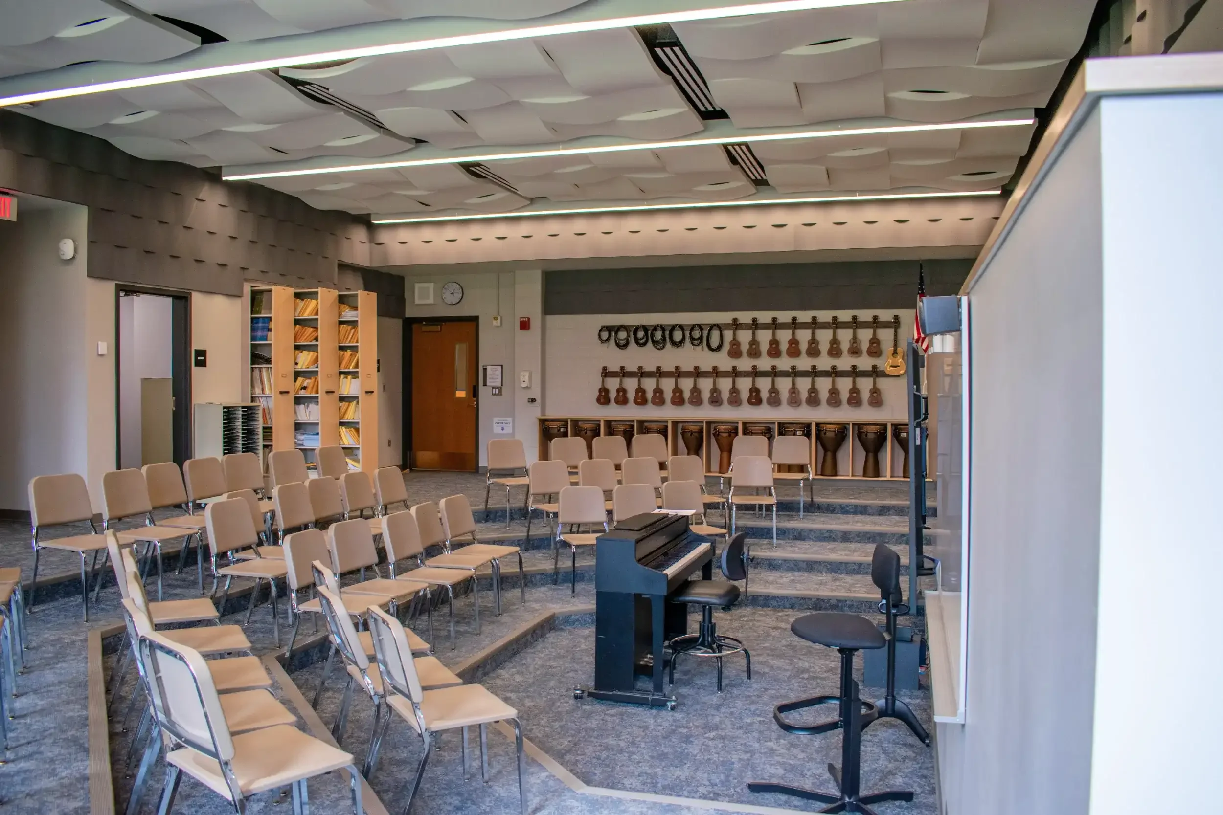 The revamped band room showing piano and percussion