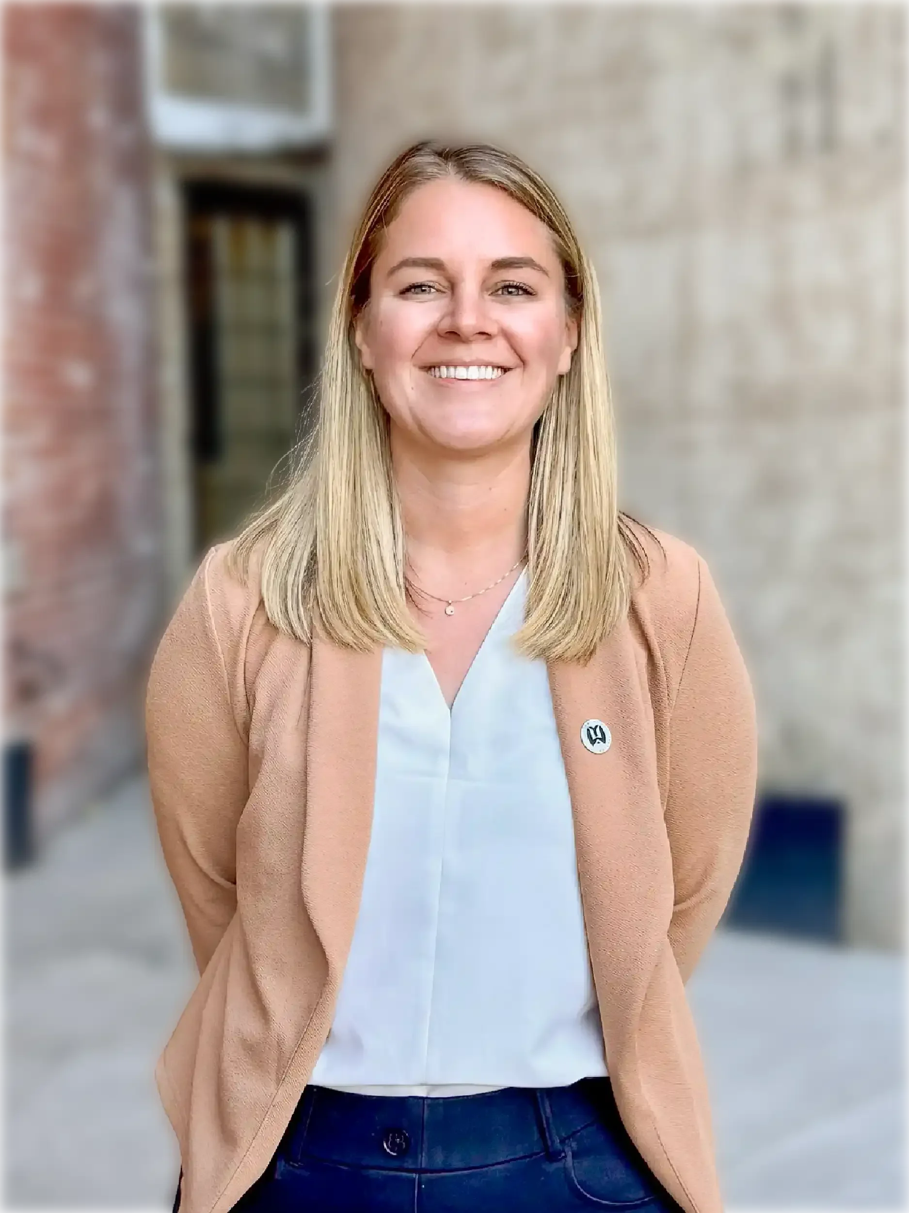 A headshot of Alyssa Catlin, a partner at Young & Wright Architectural