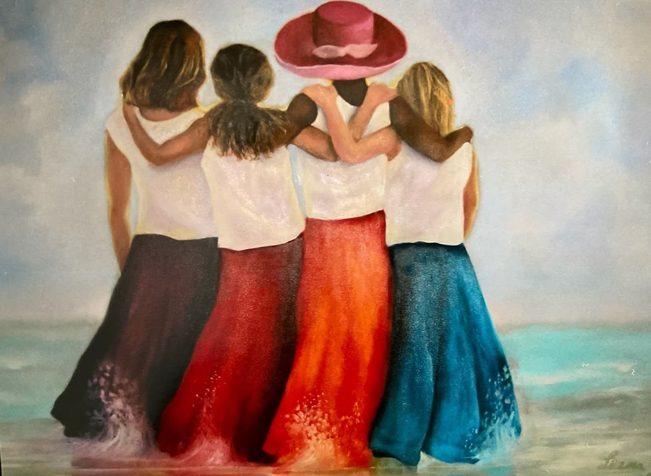 A painting of four women standing arm in arm on a beach. They are wearing white tops and long skirts in black, red, orange, and blue. One woman is wearing a large pink hat. The background features soft, cloudy skies and the ocean.